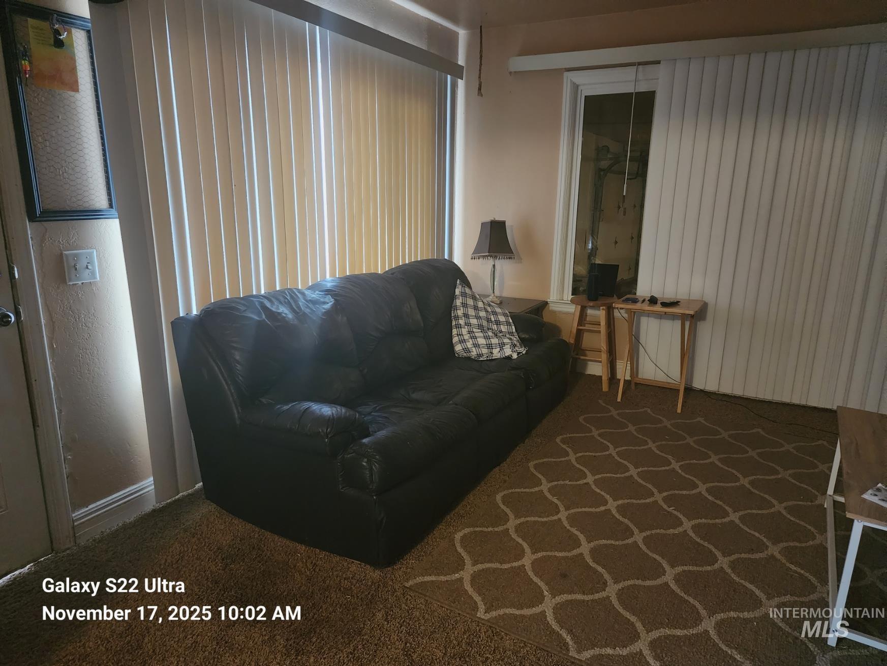 Living room featuring carpet