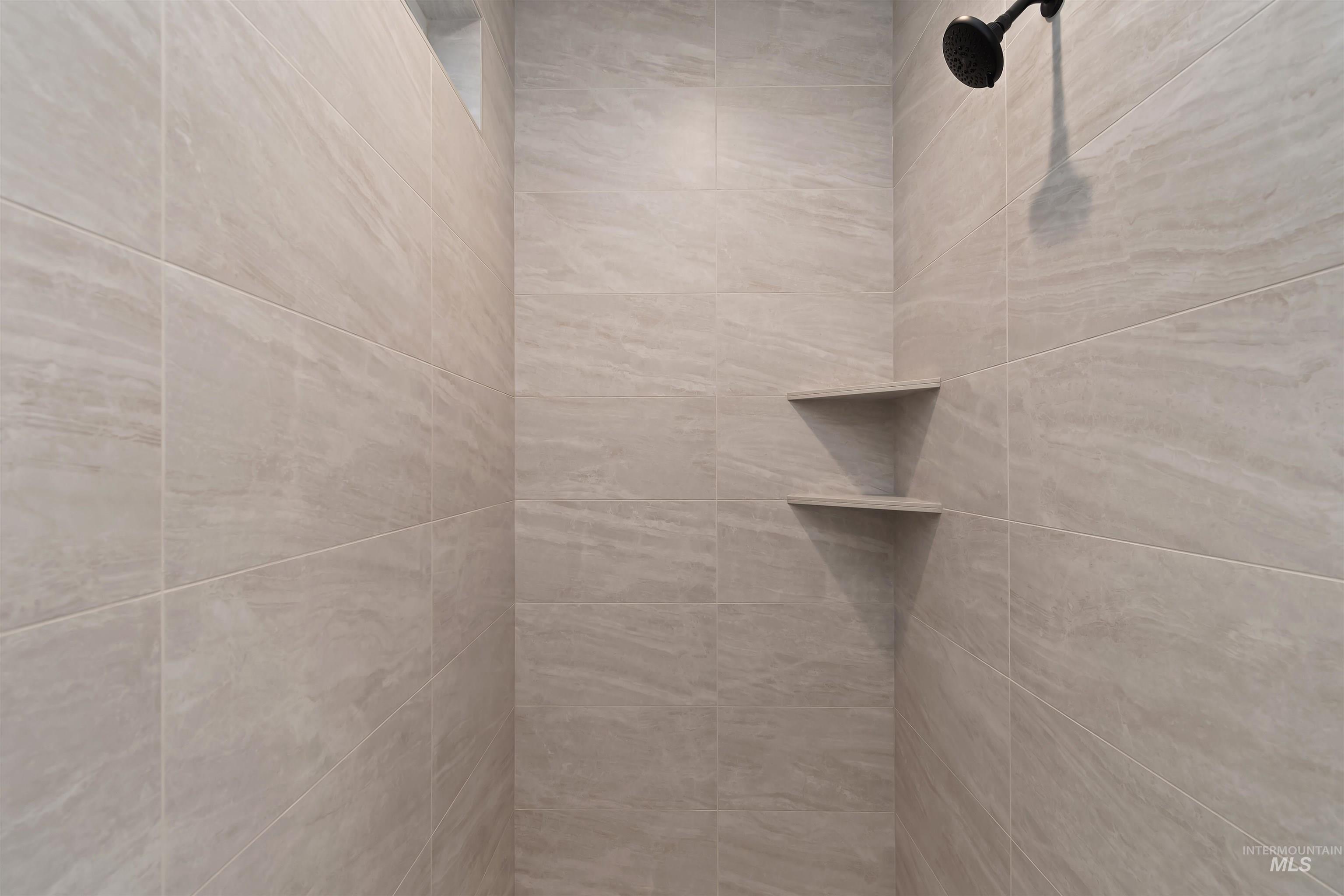 Bathroom view of tiled shower