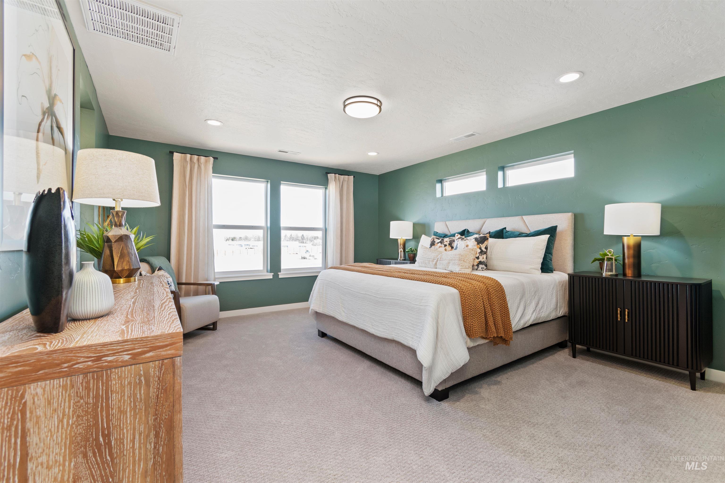 Bedroom featuring carpet and recessed lighting