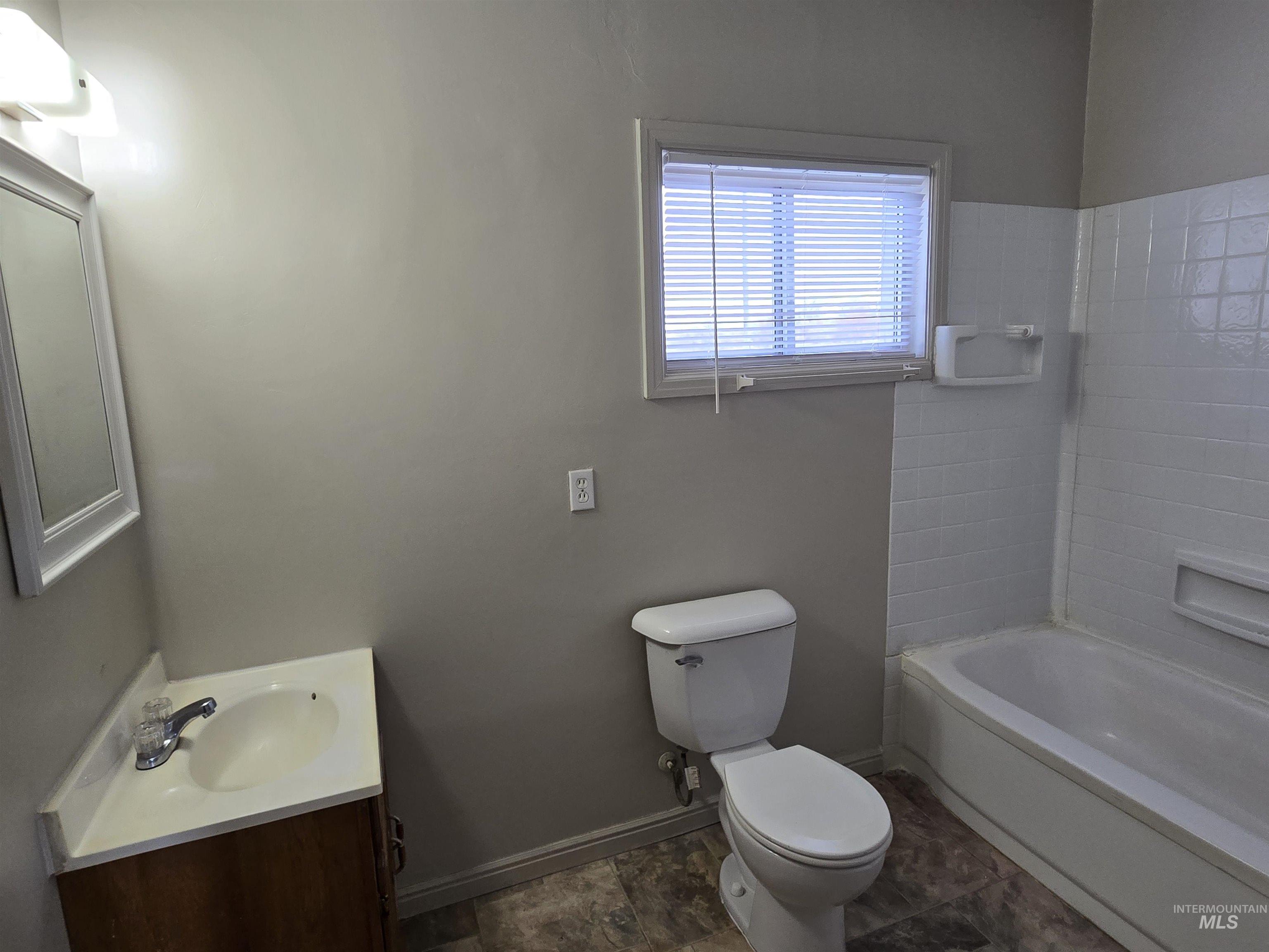 Bathroom with vanity and toilet