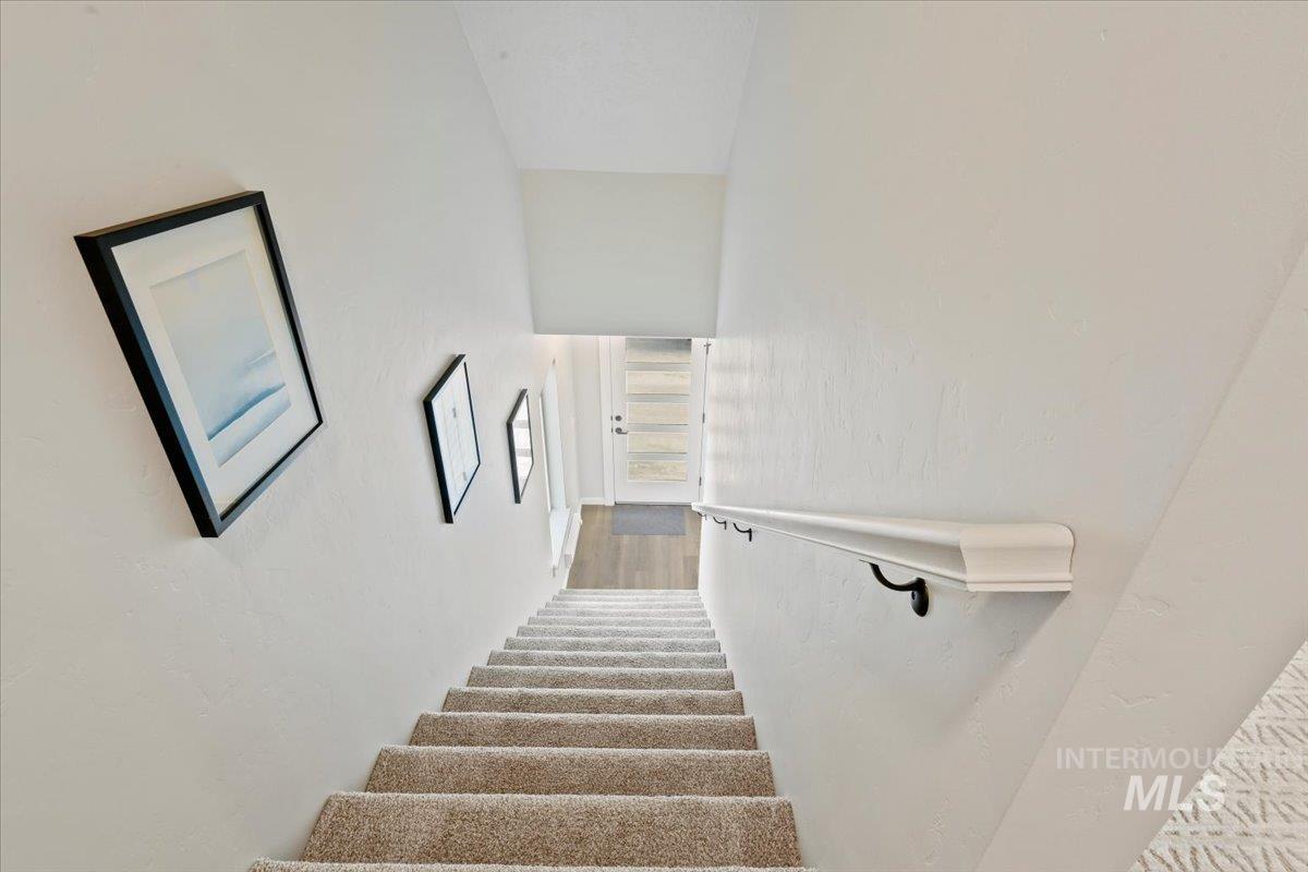 Stairway with wood finished floors