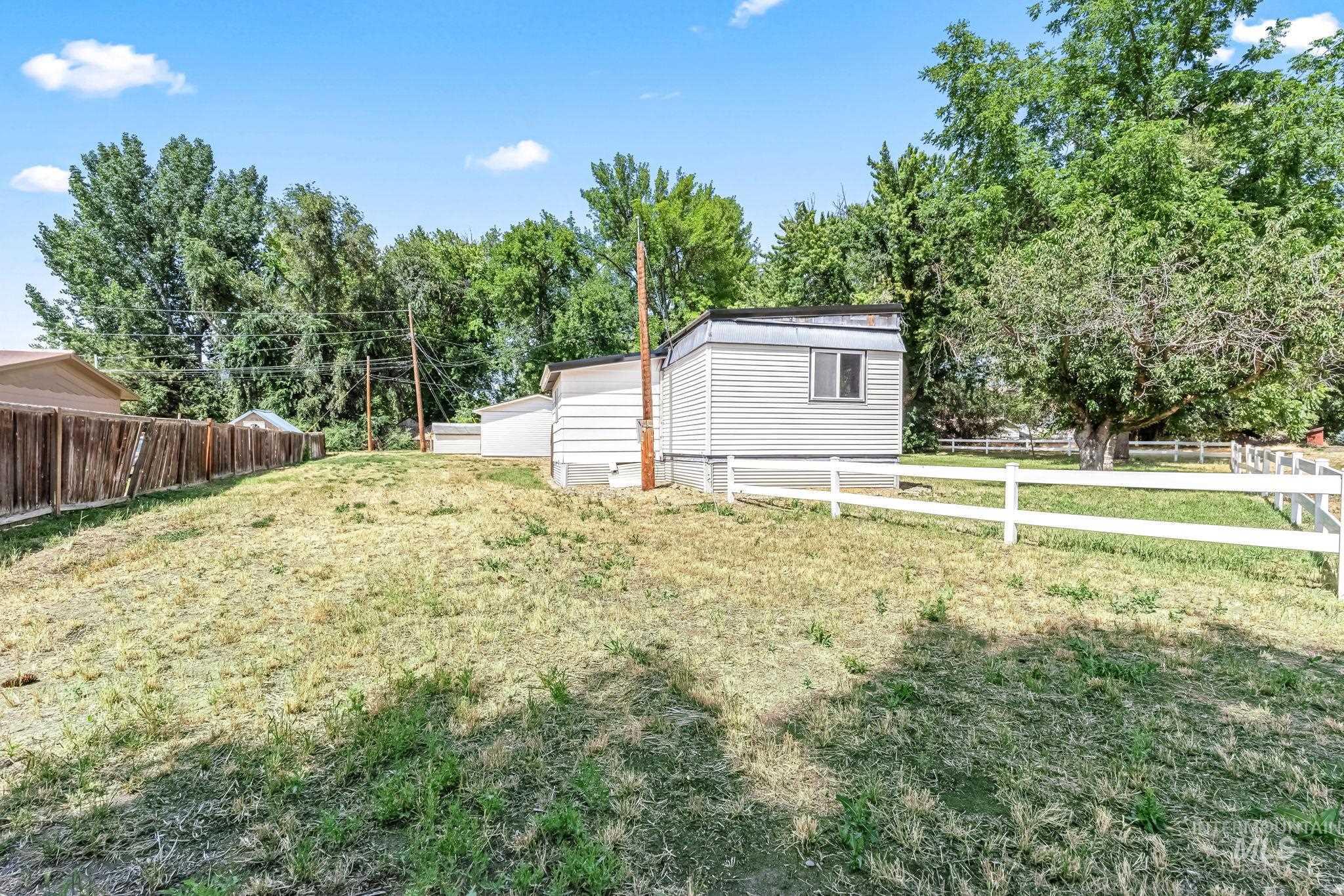 View of yard with an outbuilding