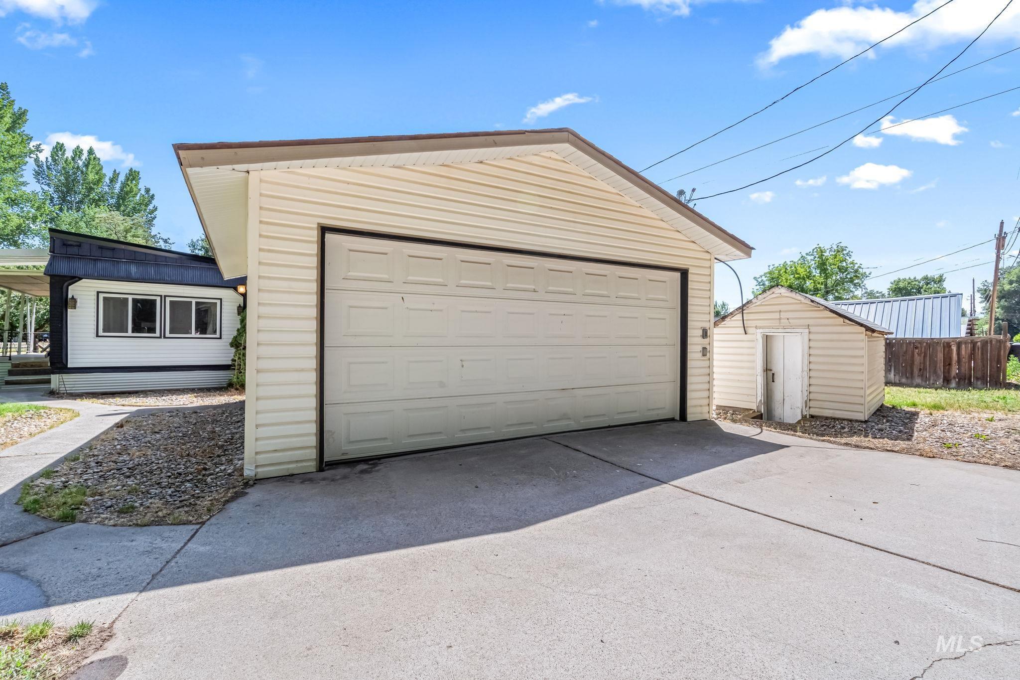 Detached garage with a shed
