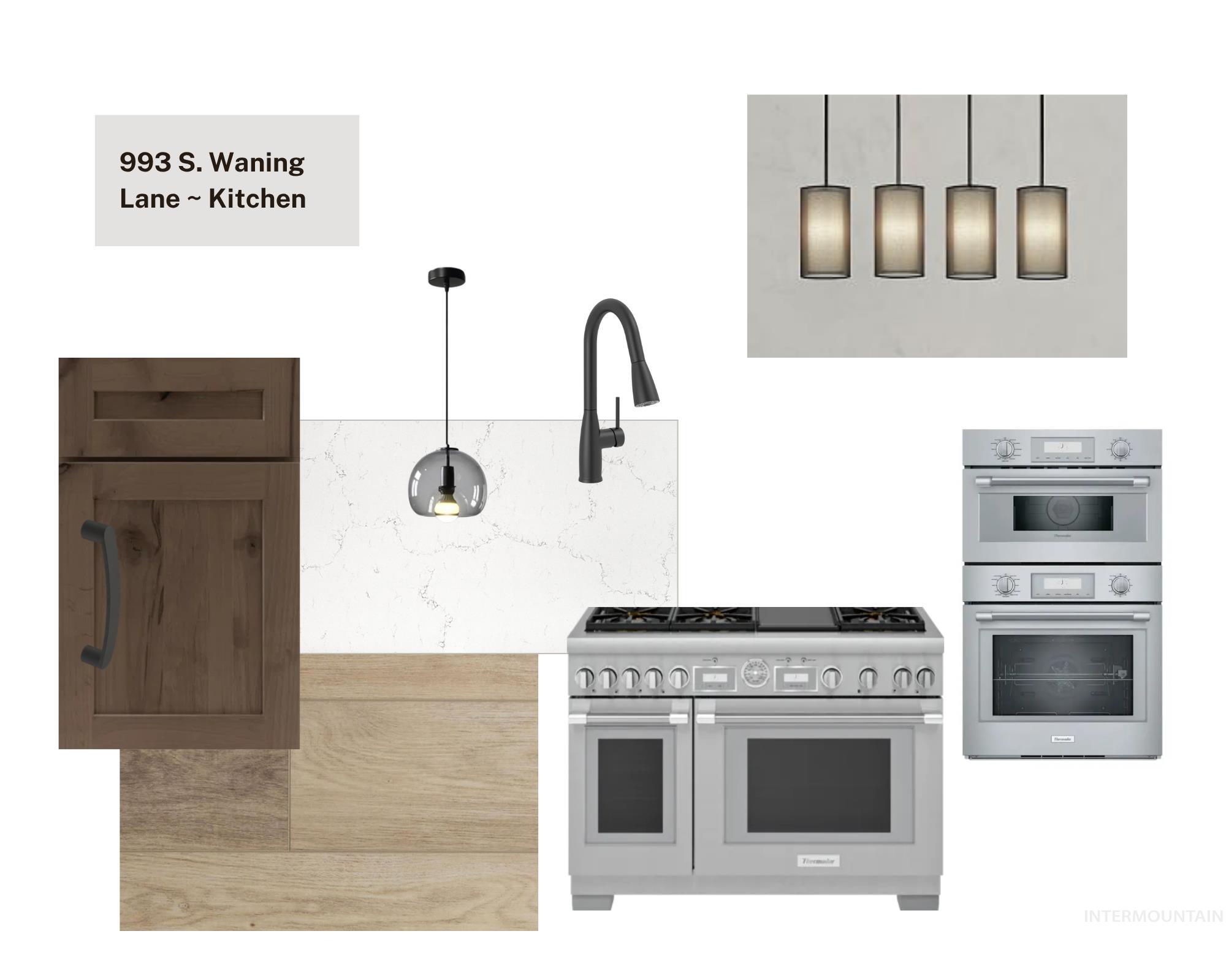 Kitchen featuring appliances with stainless steel finishes and hanging light fixtures