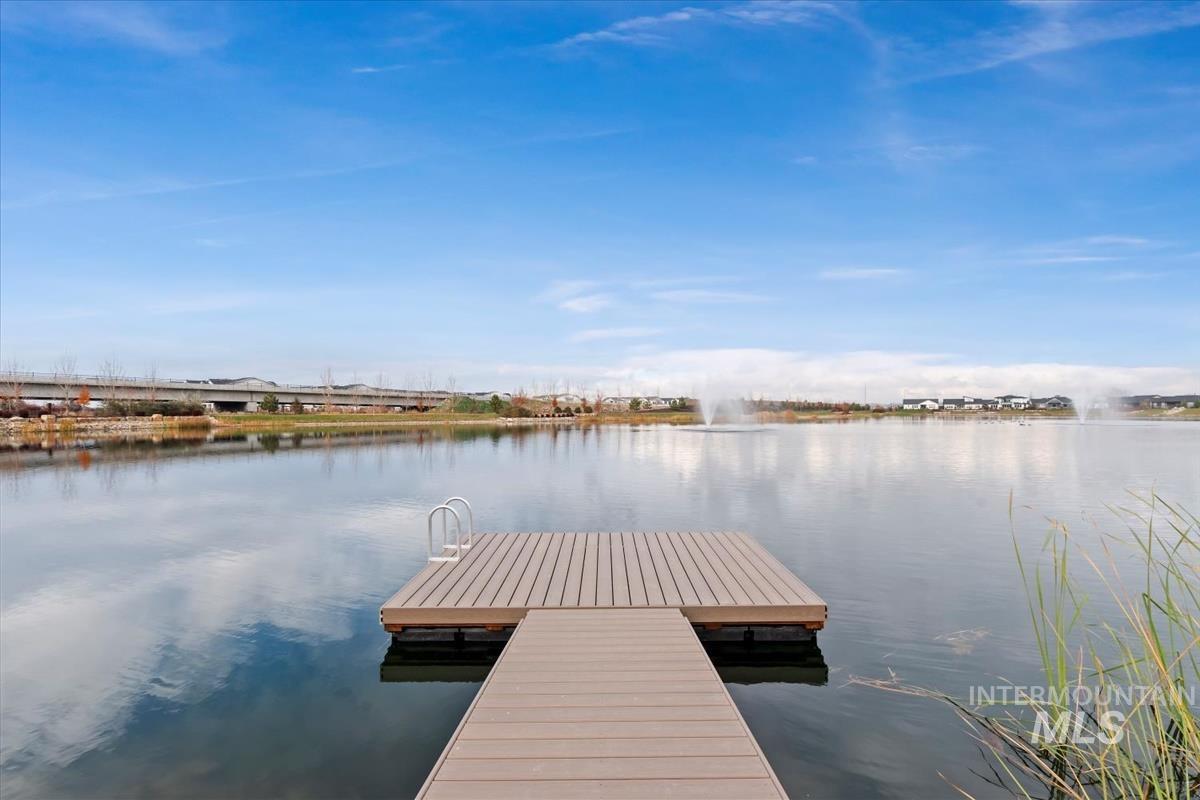 Dock featuring a water view