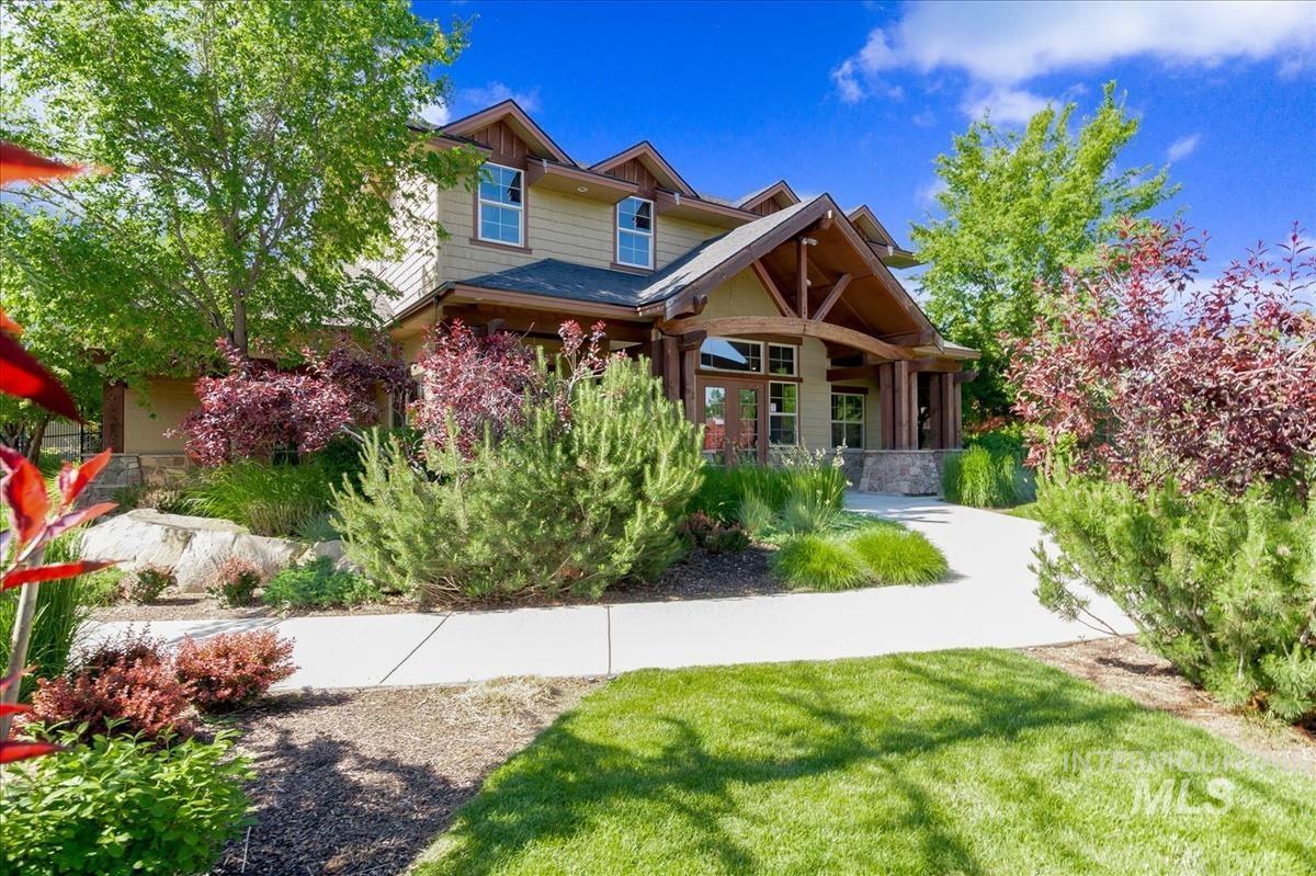 Craftsman inspired home featuring a front yard and covered porch