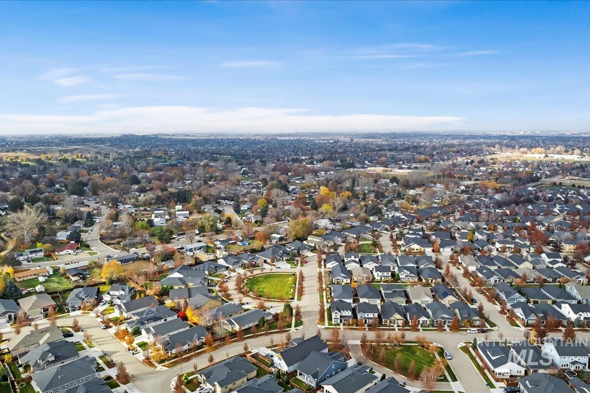 View of property location with nearby suburban area