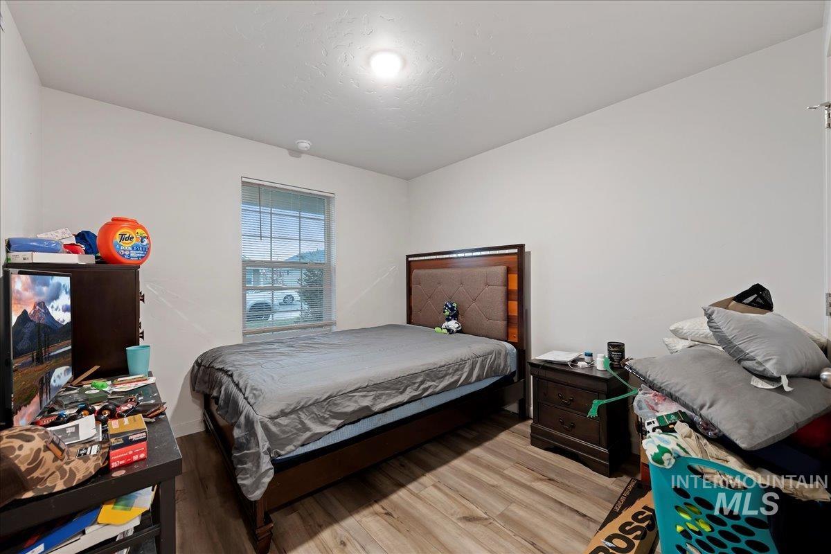 Bedroom featuring light wood finished floors