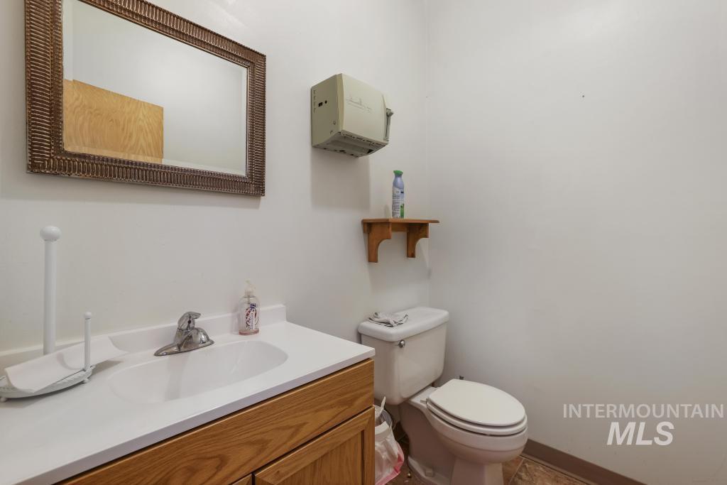 Bathroom with vanity and tile patterned flooring