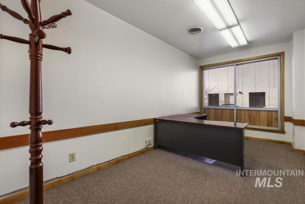Office with carpet flooring