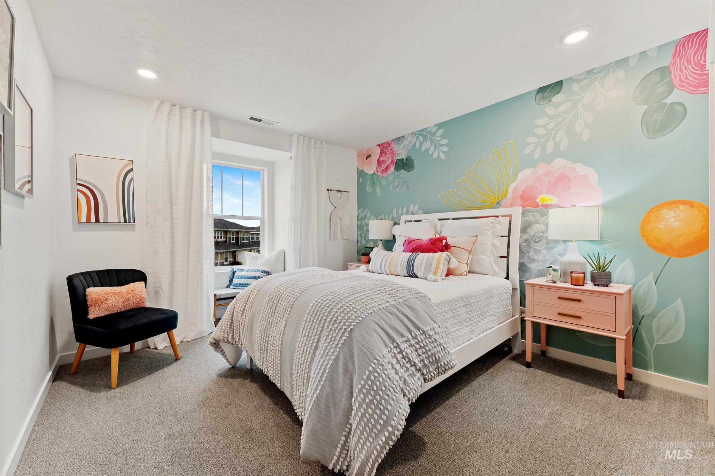 Bedroom with light carpet and recessed lighting