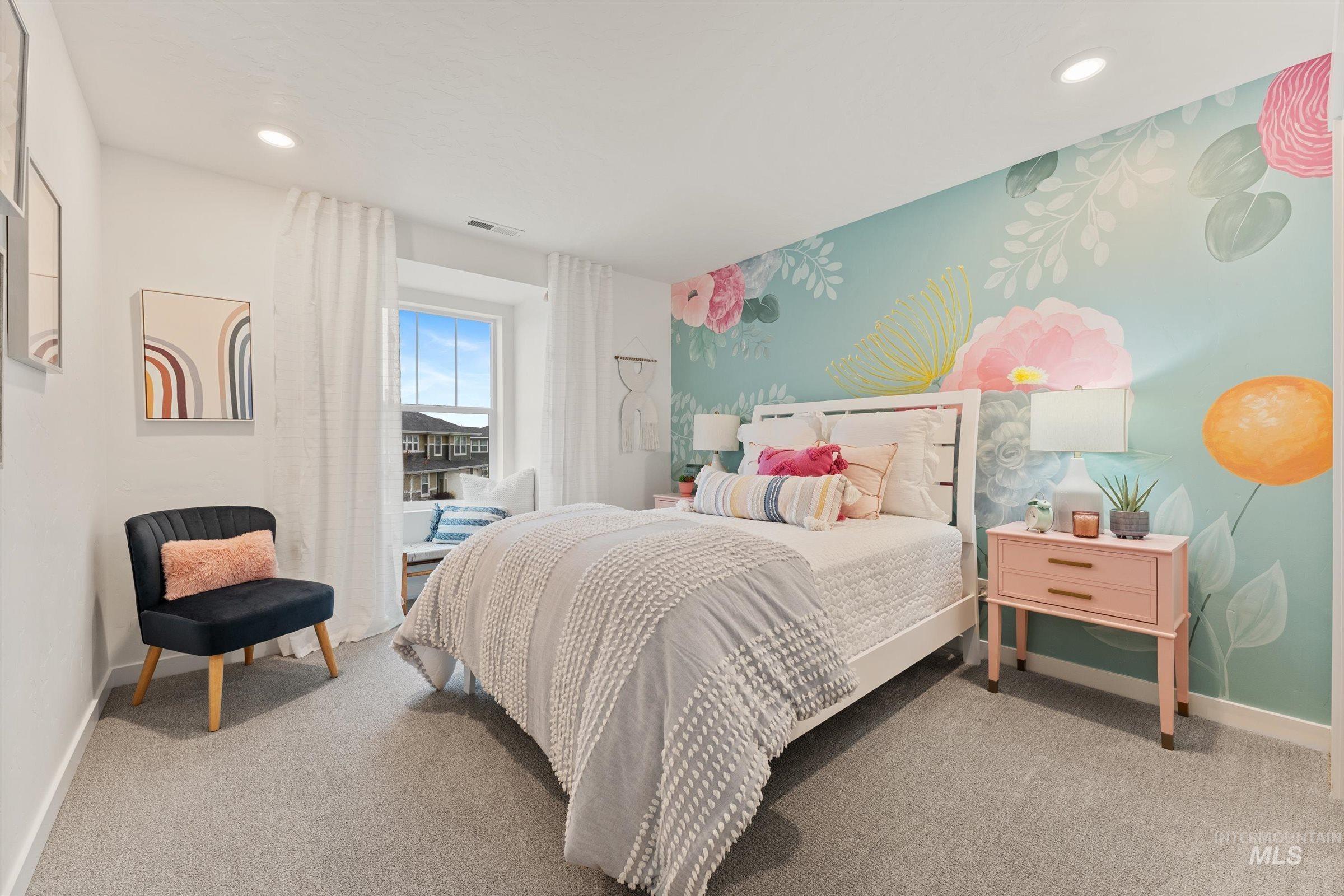 Bedroom featuring light carpet and recessed lighting