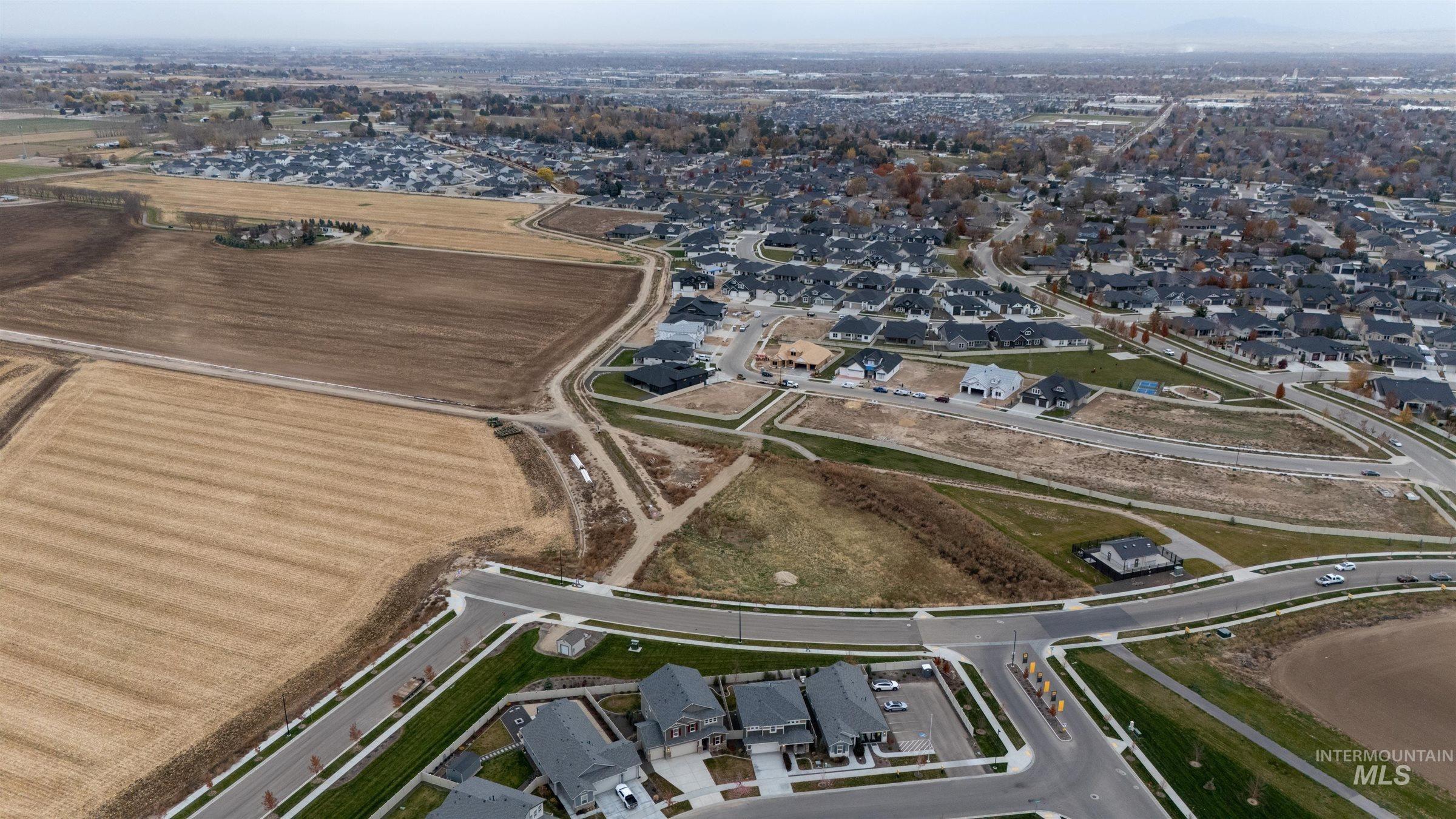 Aerial overview of property's location with nearby suburban area