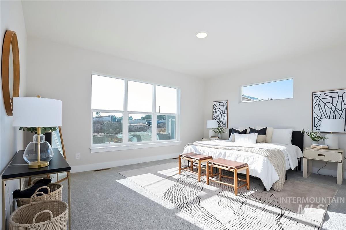 Bedroom featuring carpet and recessed lighting