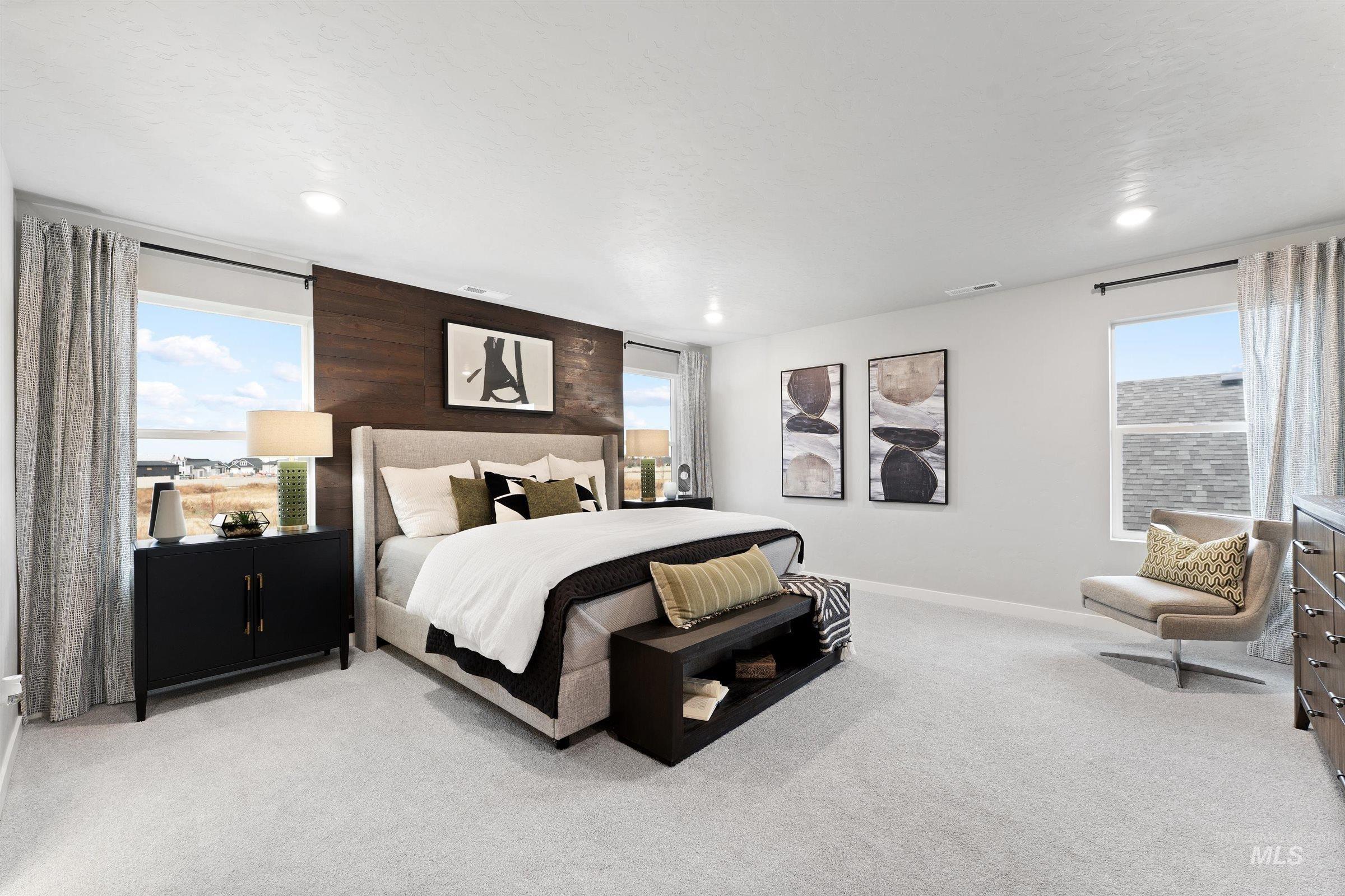 Bedroom featuring light carpet and recessed lighting