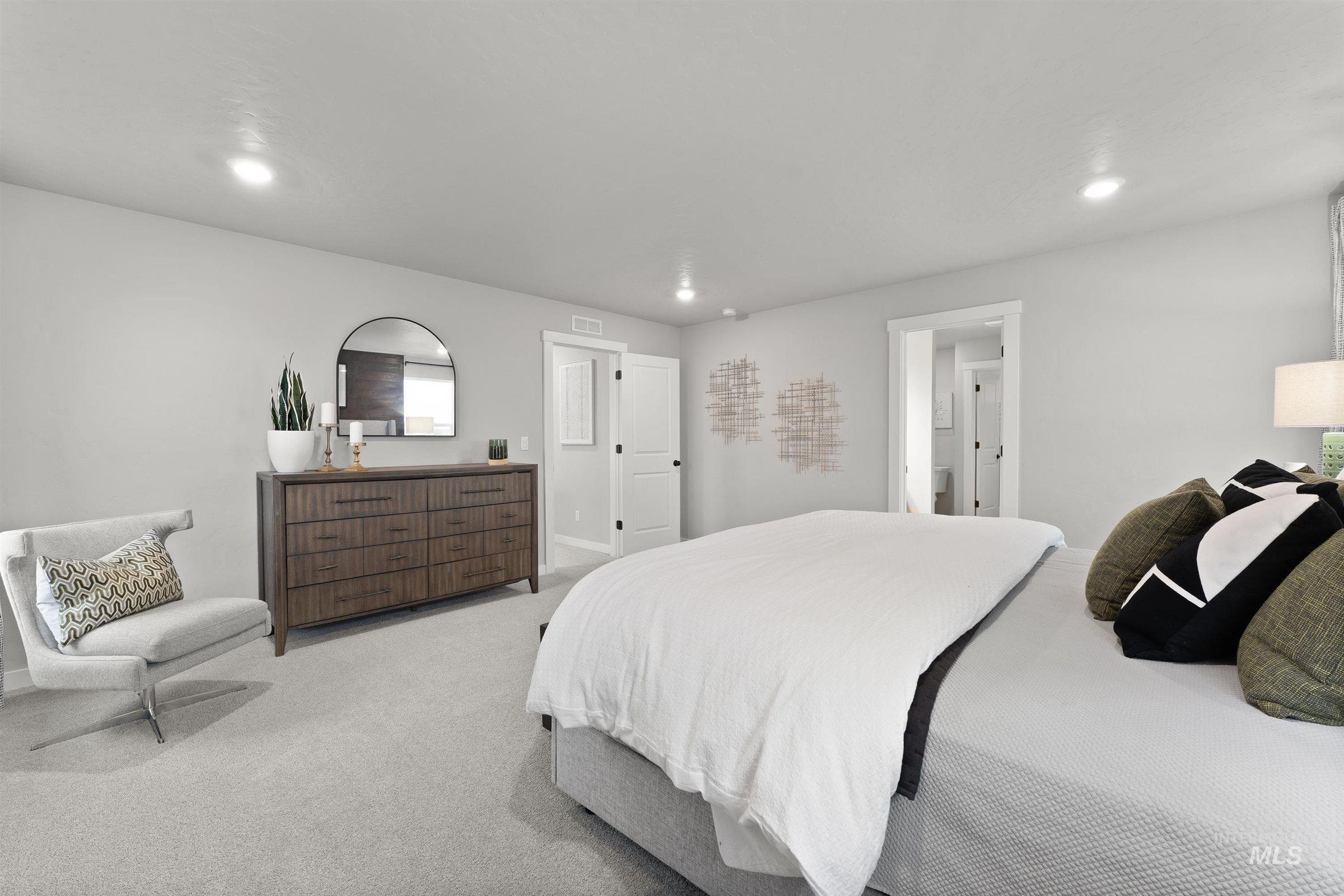 Bedroom with carpet flooring and recessed lighting