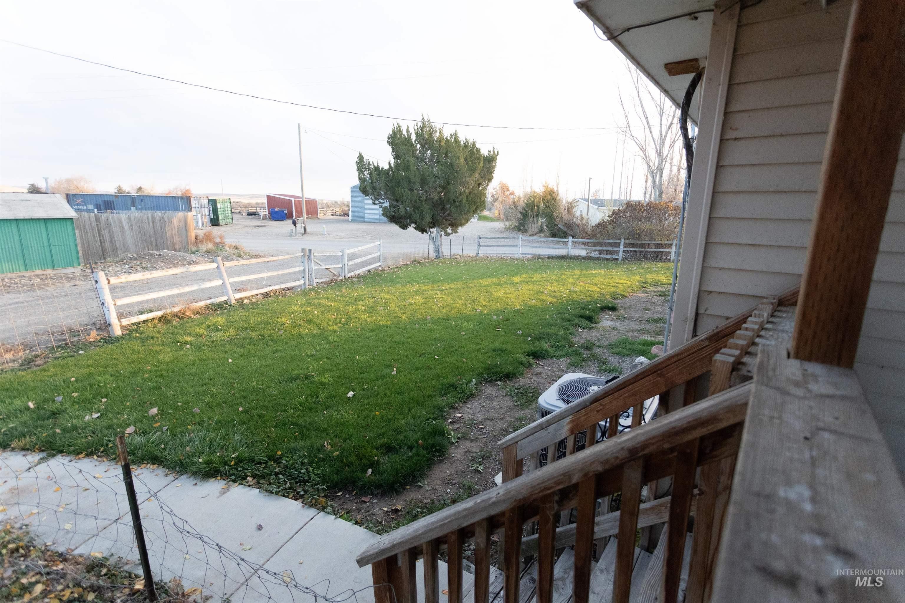 View of fenced backyard