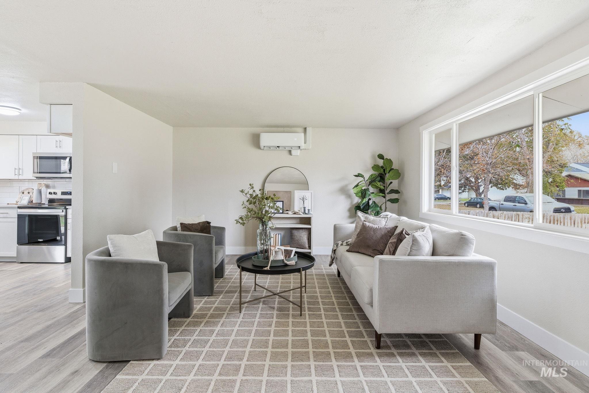 Living area featuring light wood finished floors