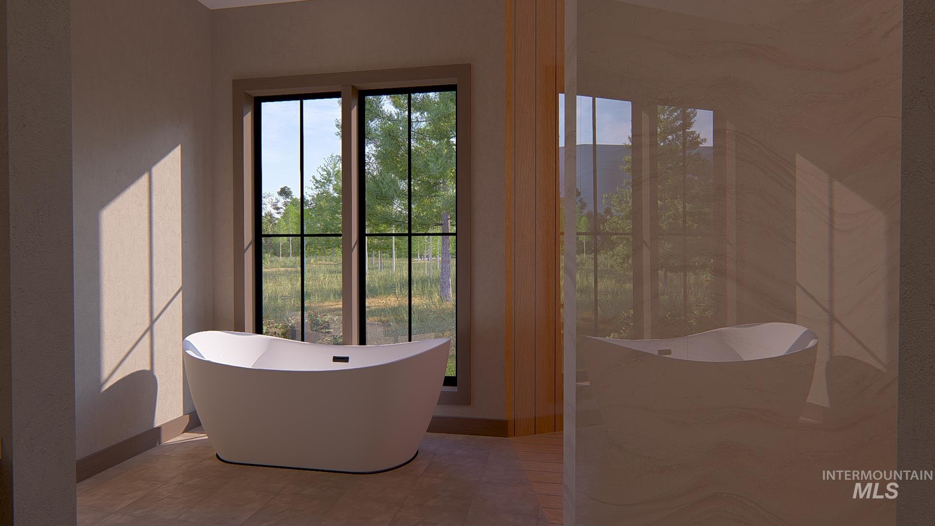 Bathroom featuring a soaking tub and a marble finish shower