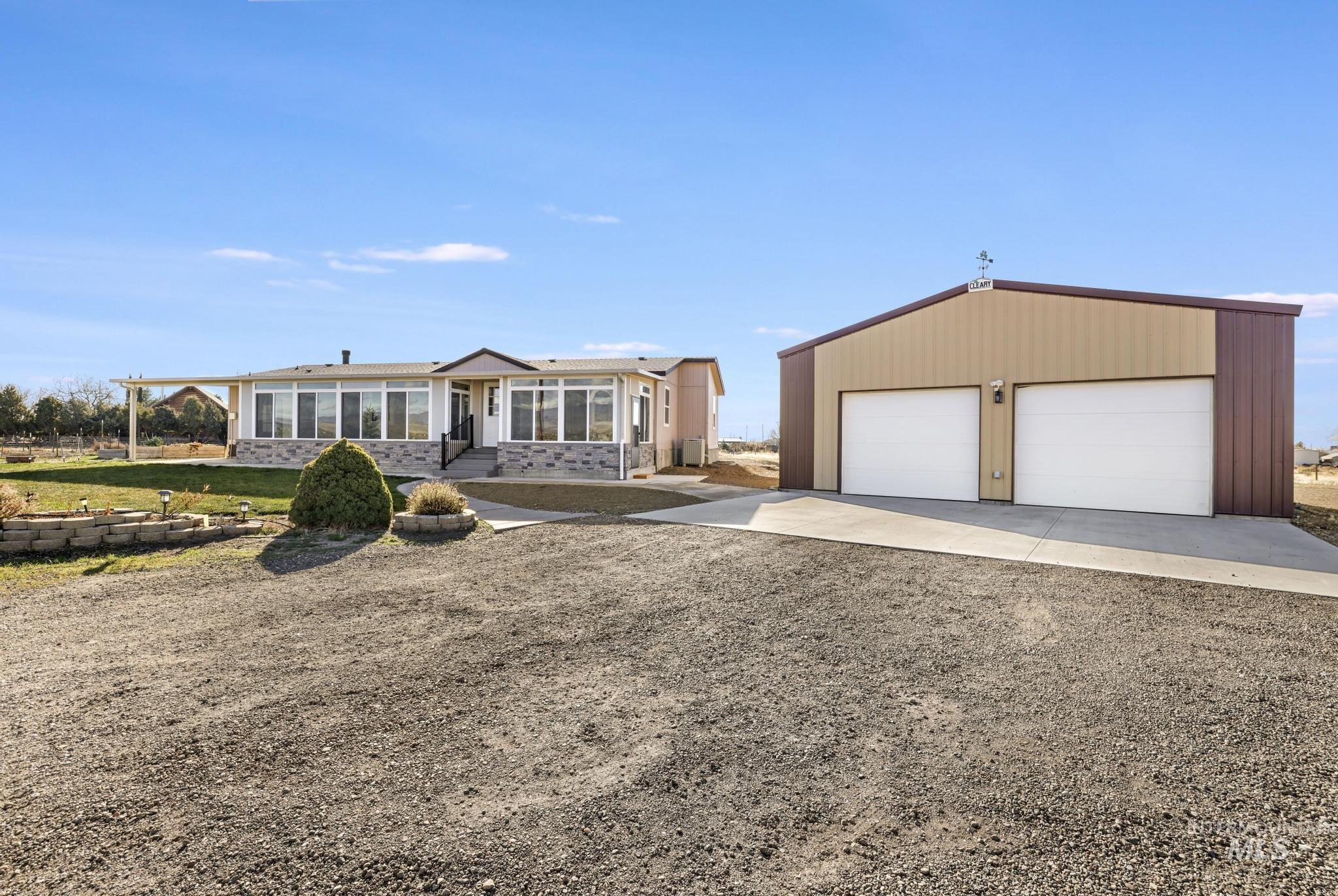 View of front of home featuring a 30x40 Cleary shop/garage