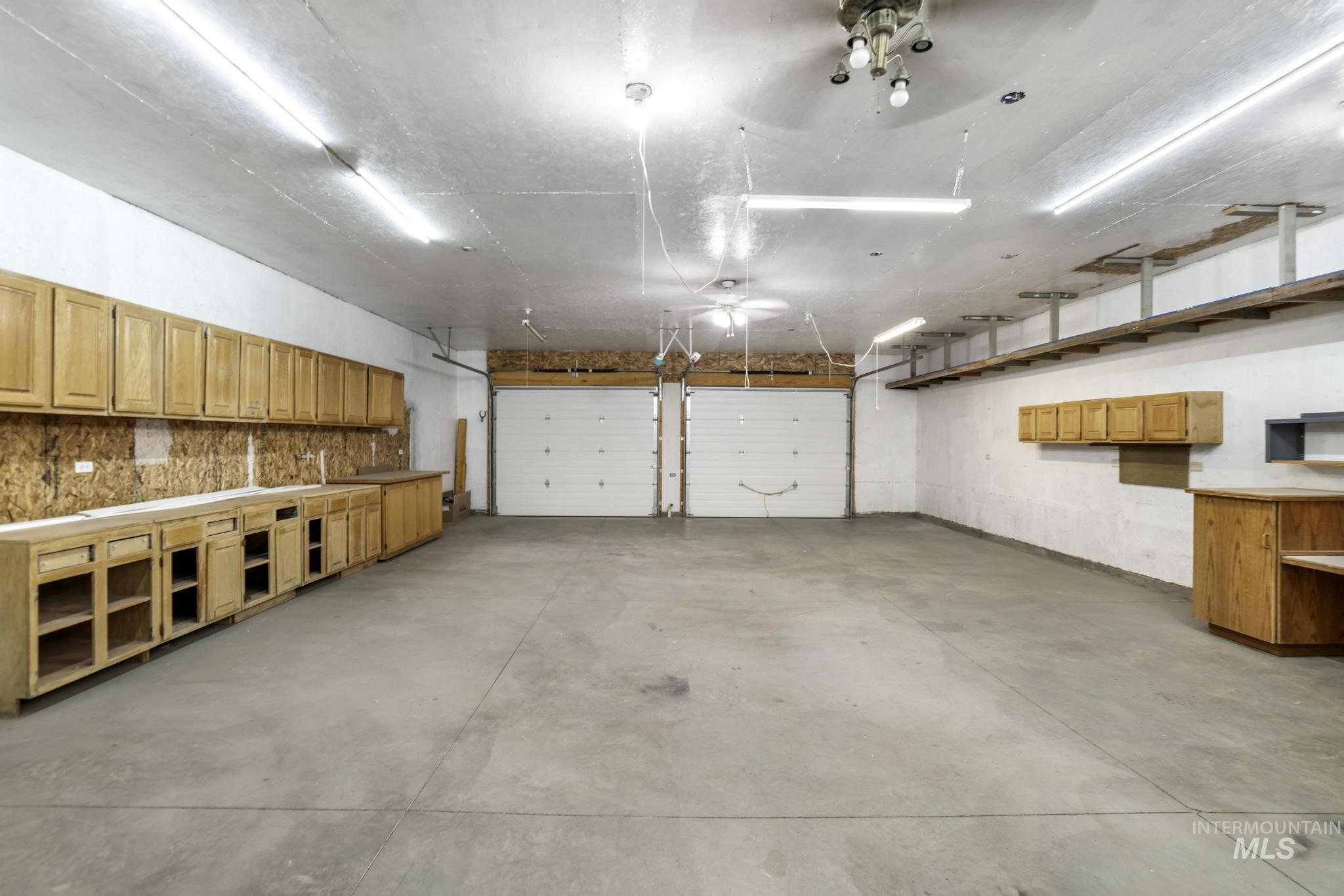 View of shop/garage. 30x40 Cleary with concrete floors, electrical and fully insulated.