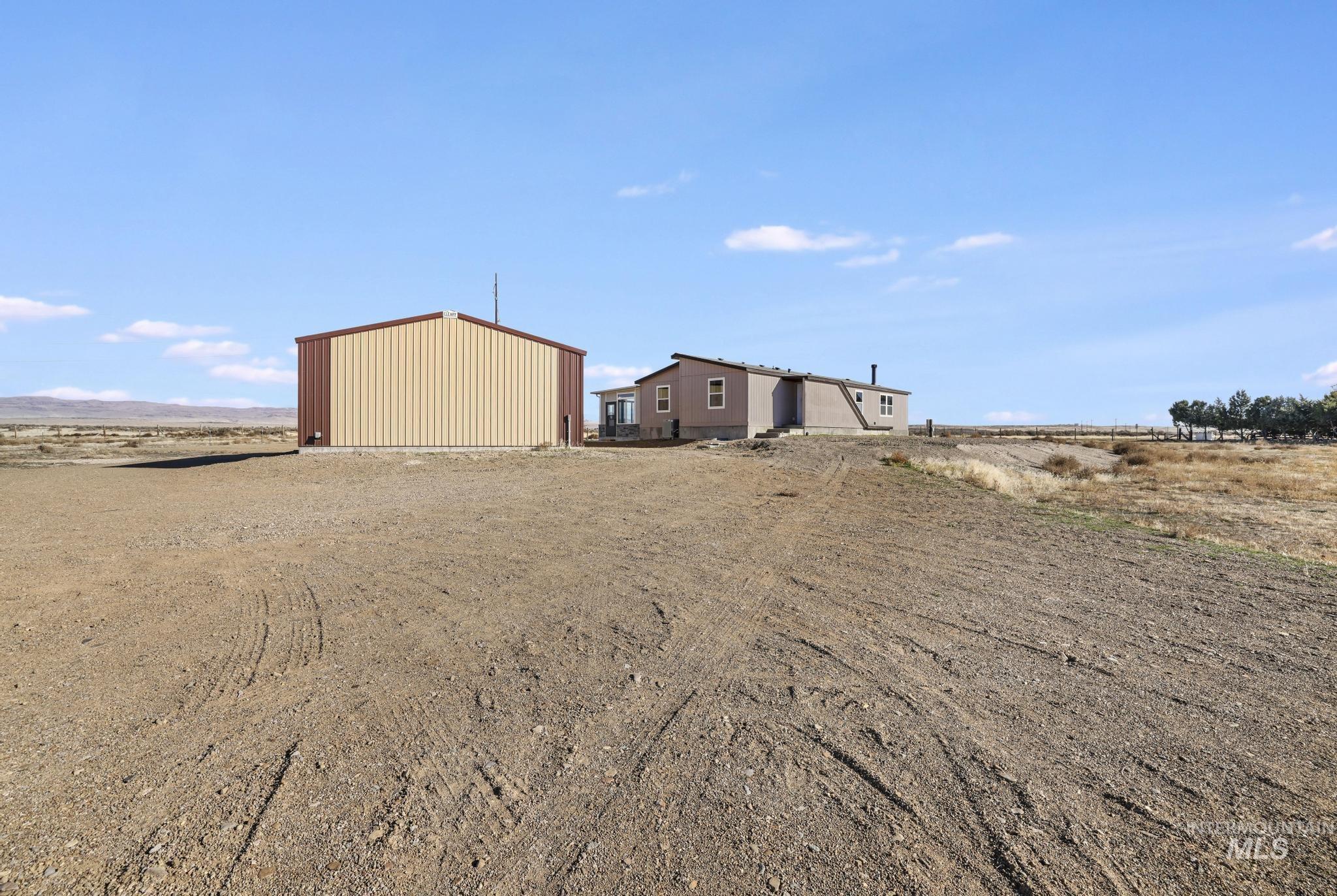 View of yard with an outbuilding