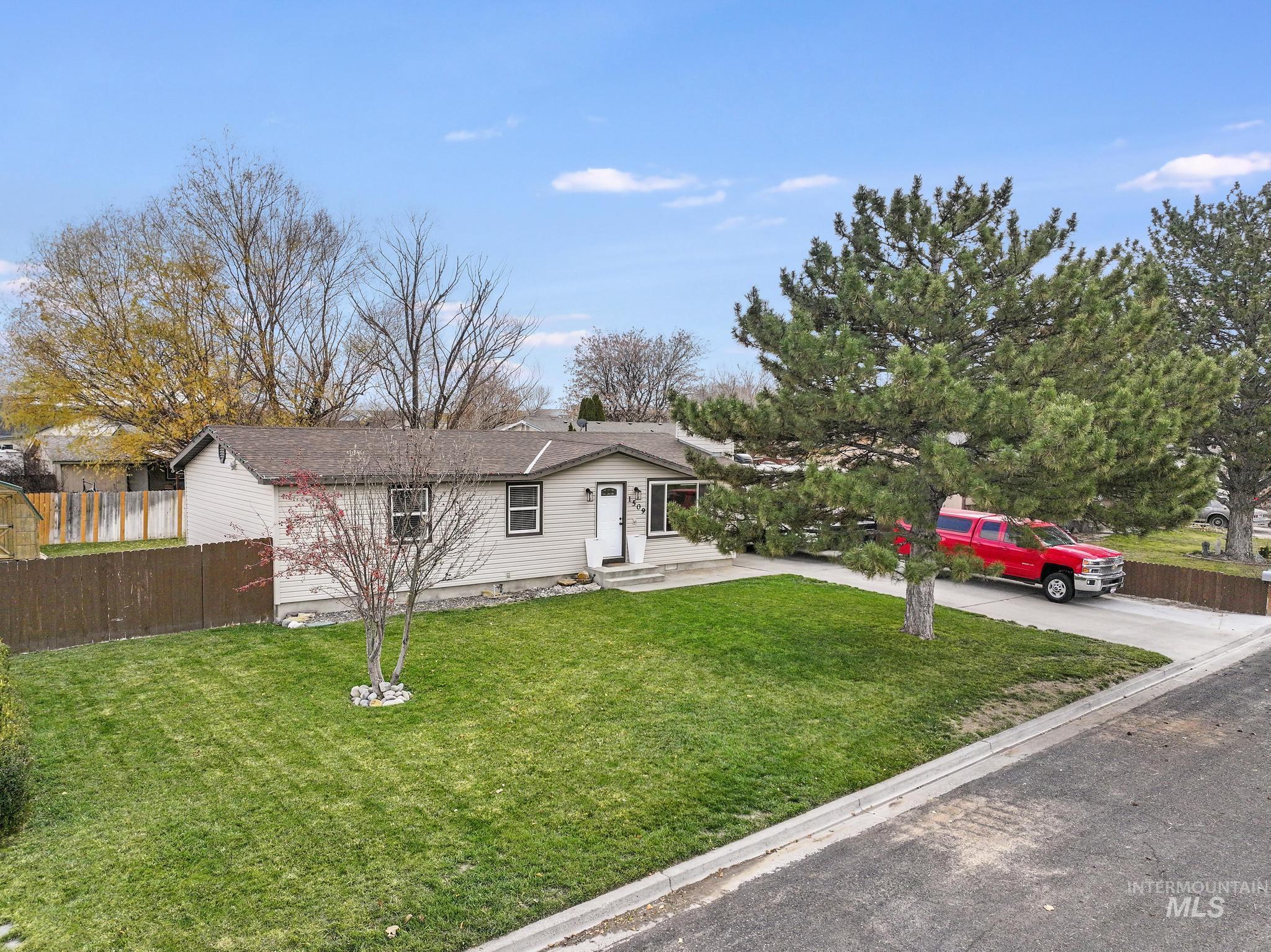 View of front of property with driveway