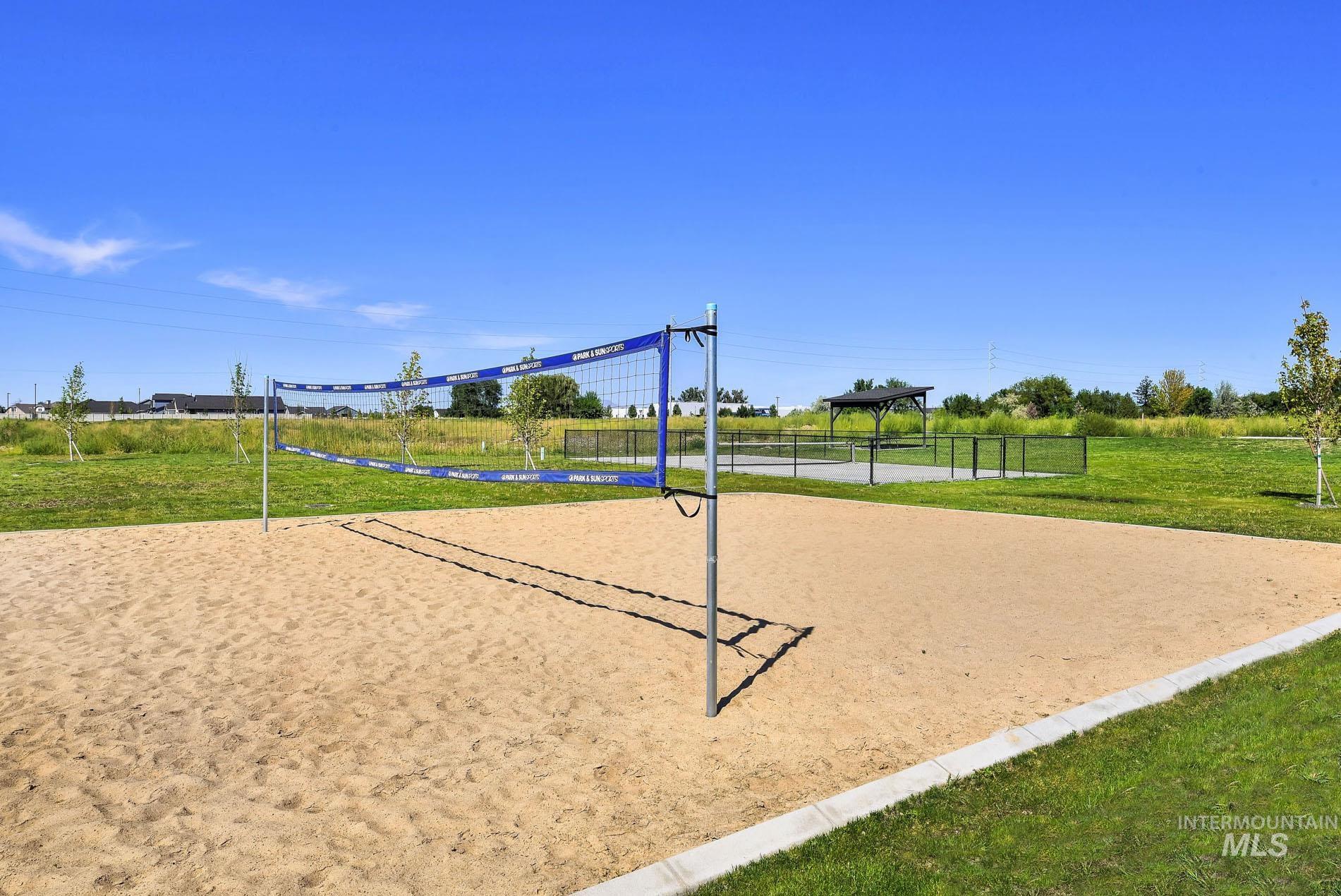 View of property's community featuring volleyball court