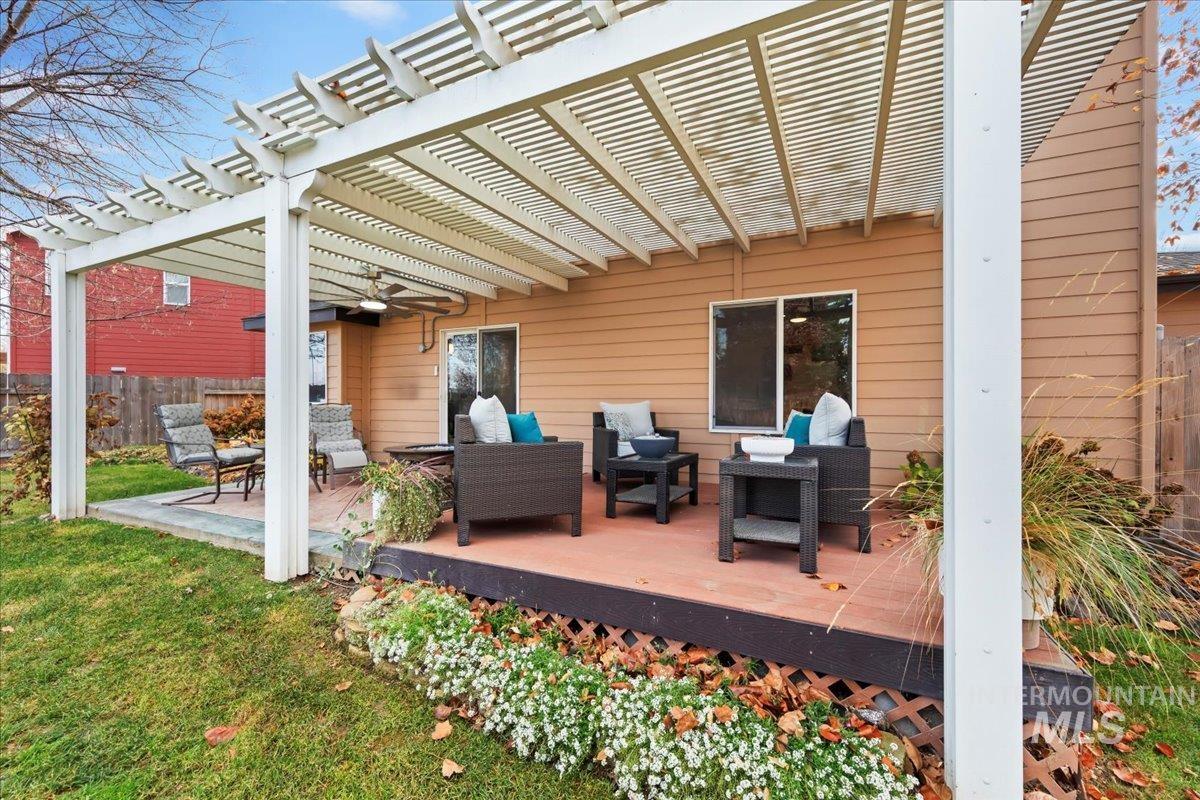 Wooden terrace with an outdoor living space