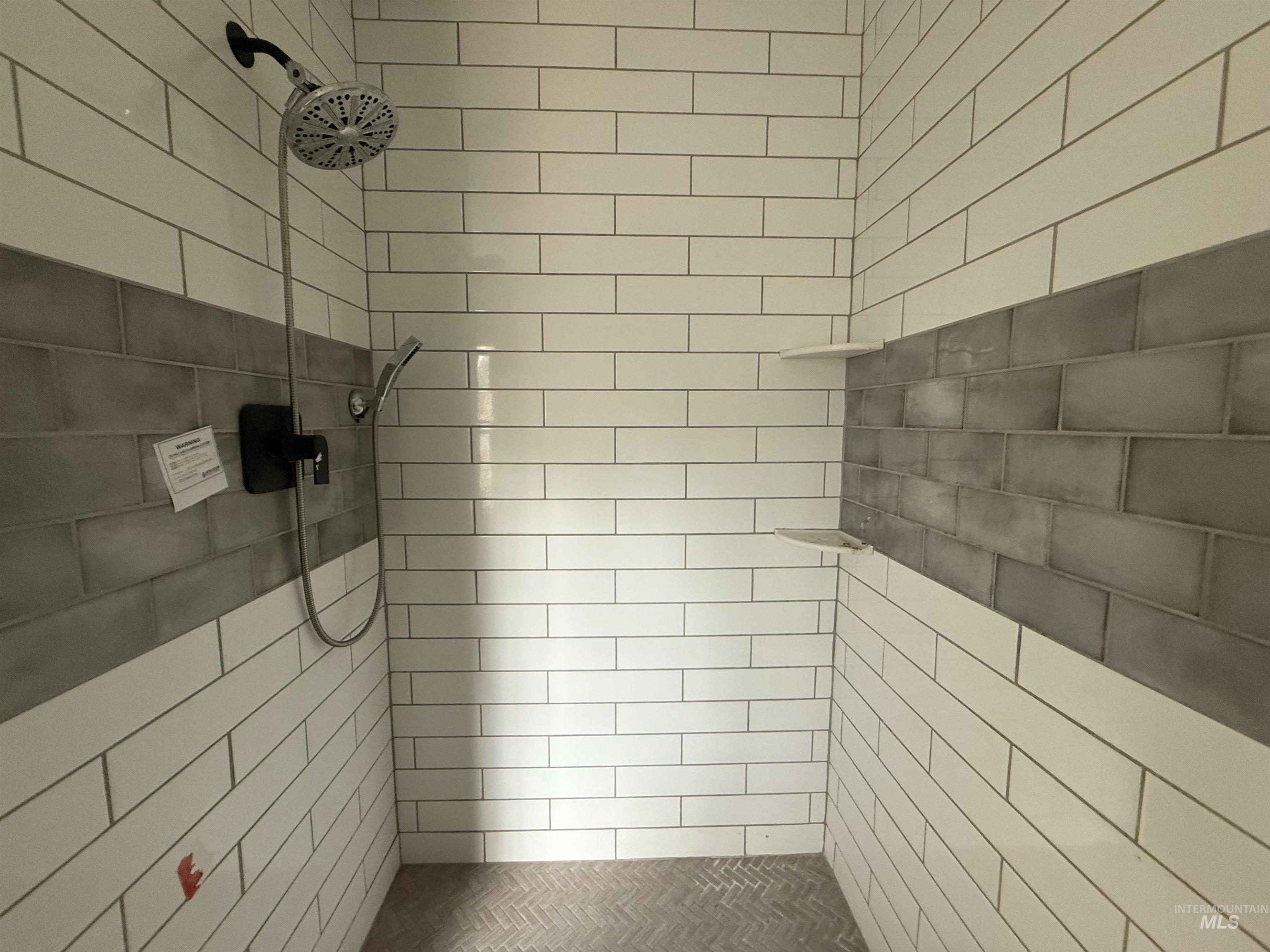 Bathroom with a tile shower