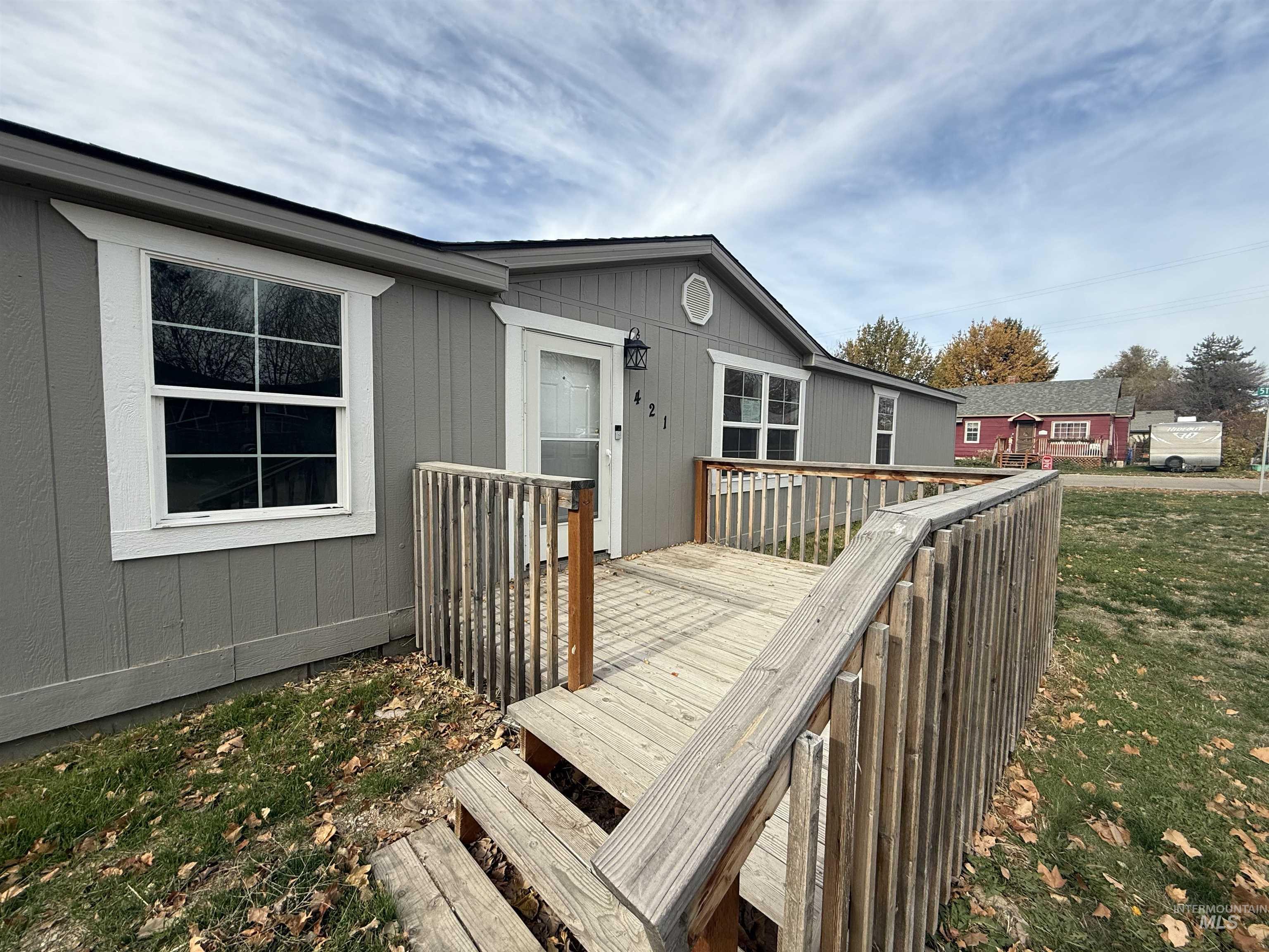 Deck featuring a yard