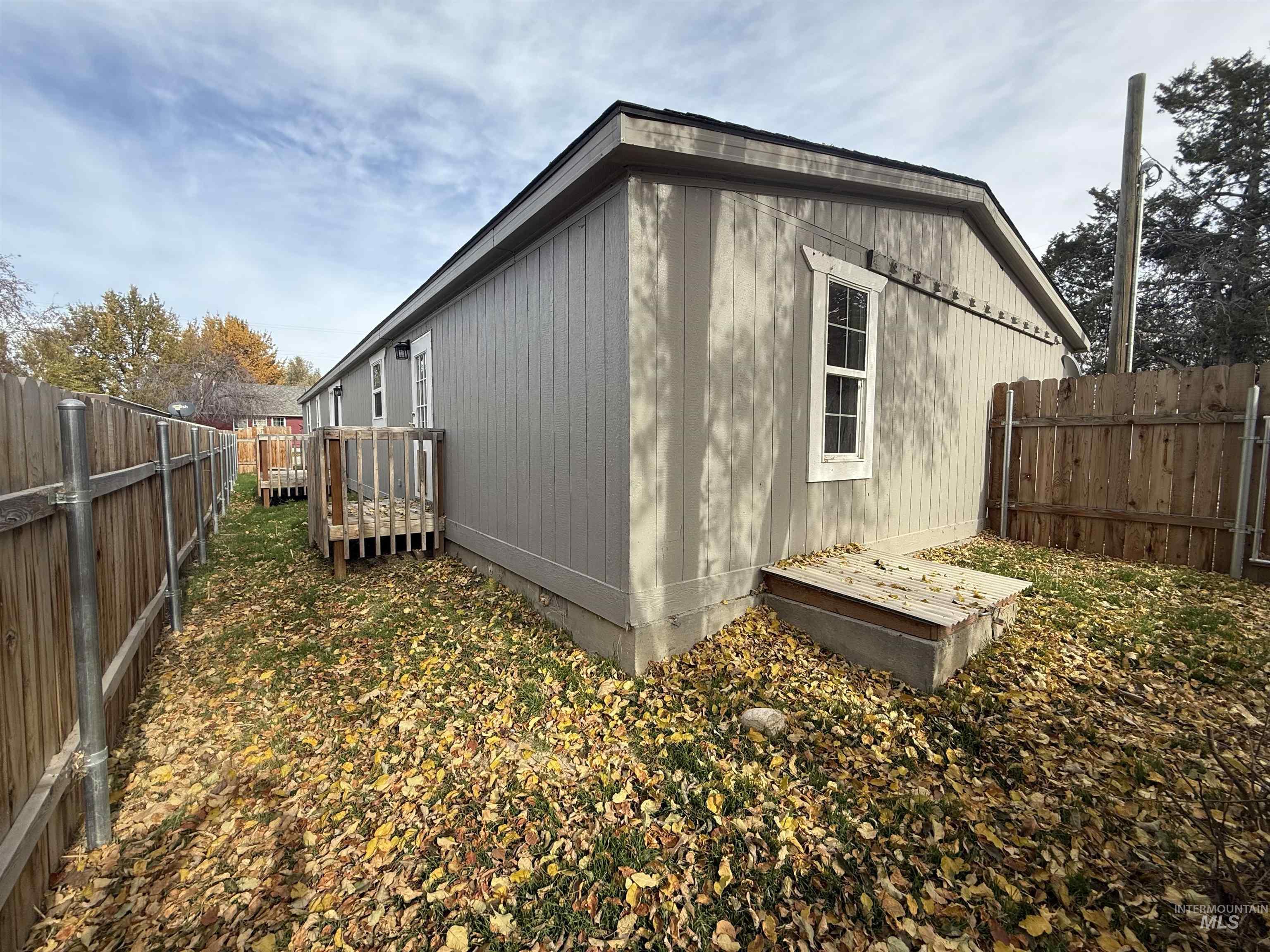 View of home's exterior with a fenced backyard
