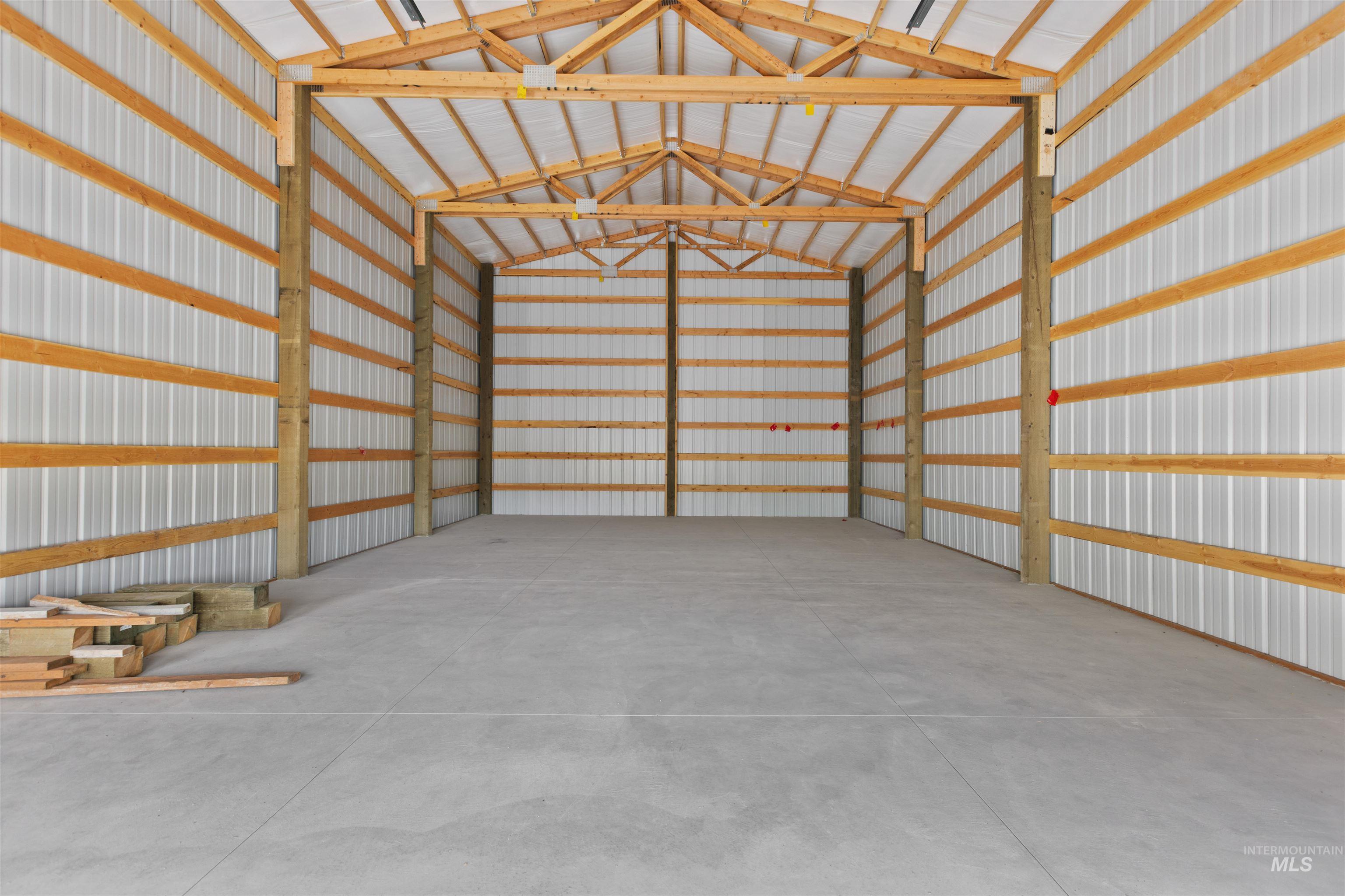 Garage featuring metal wall