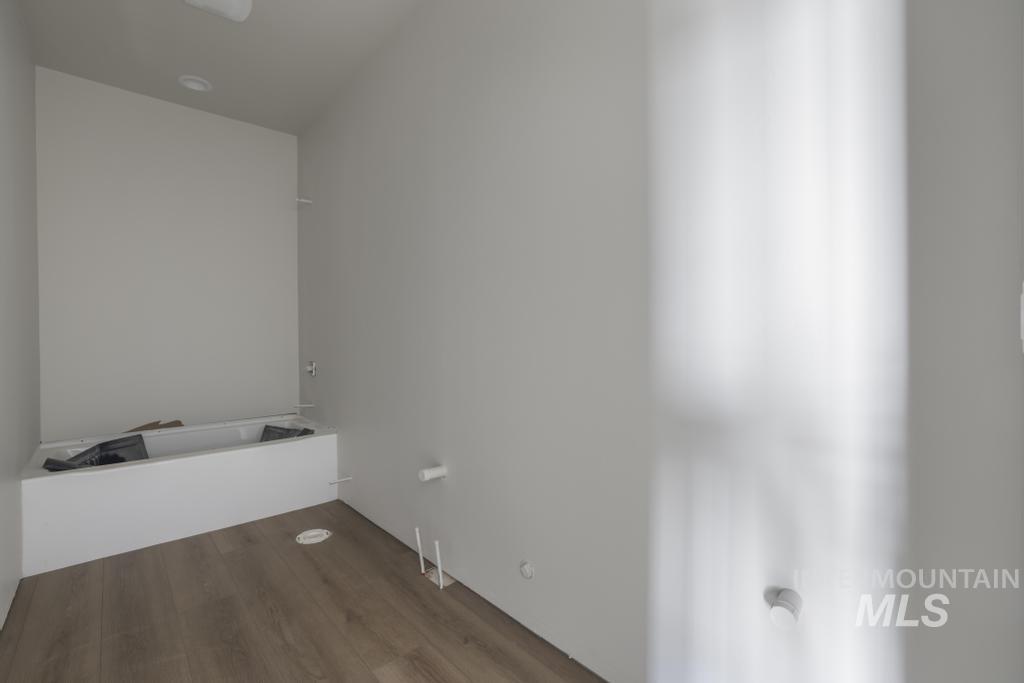 Washroom featuring wood finished floors