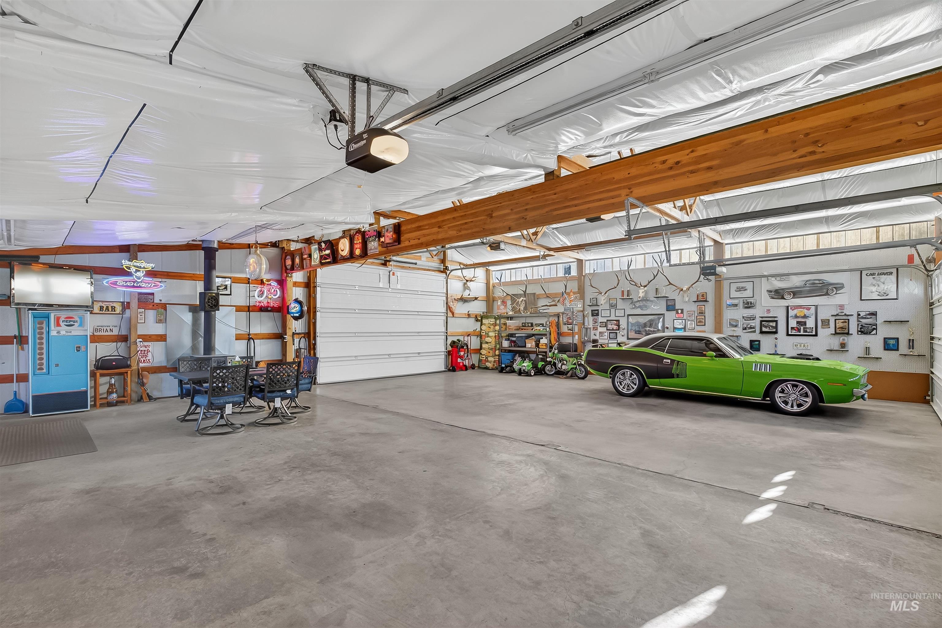 Garage featuring a garage door opener