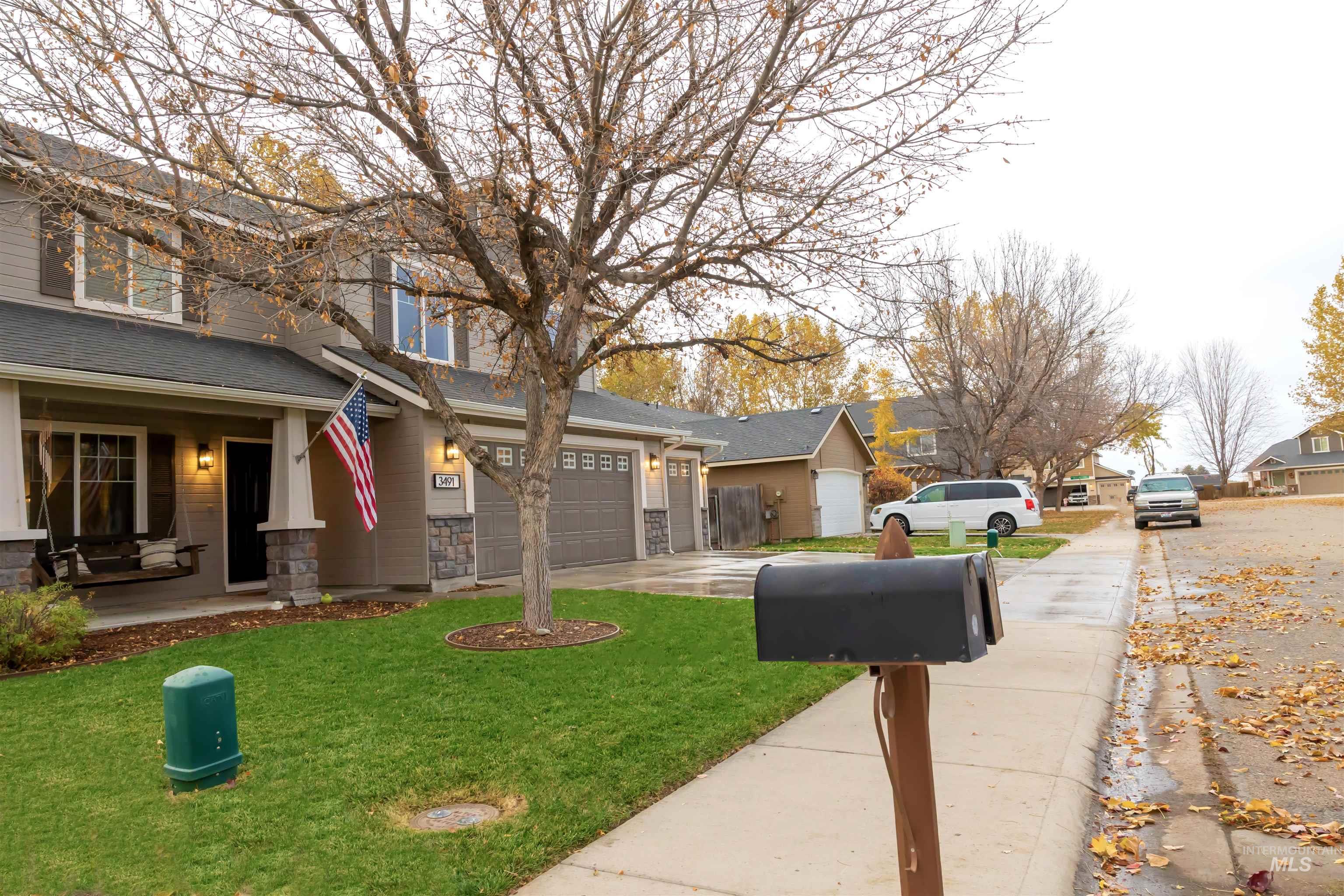 View of asphalt road with sidewalks