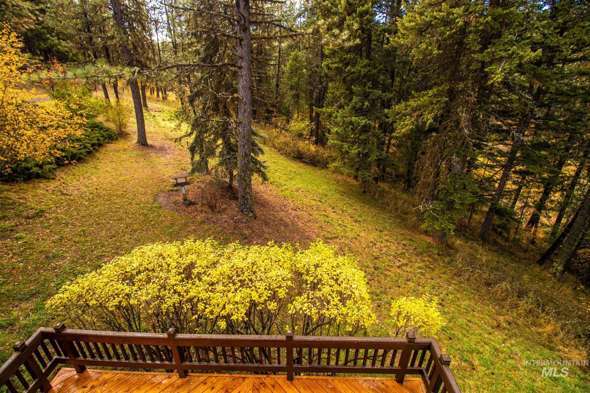 View of yard with a deck