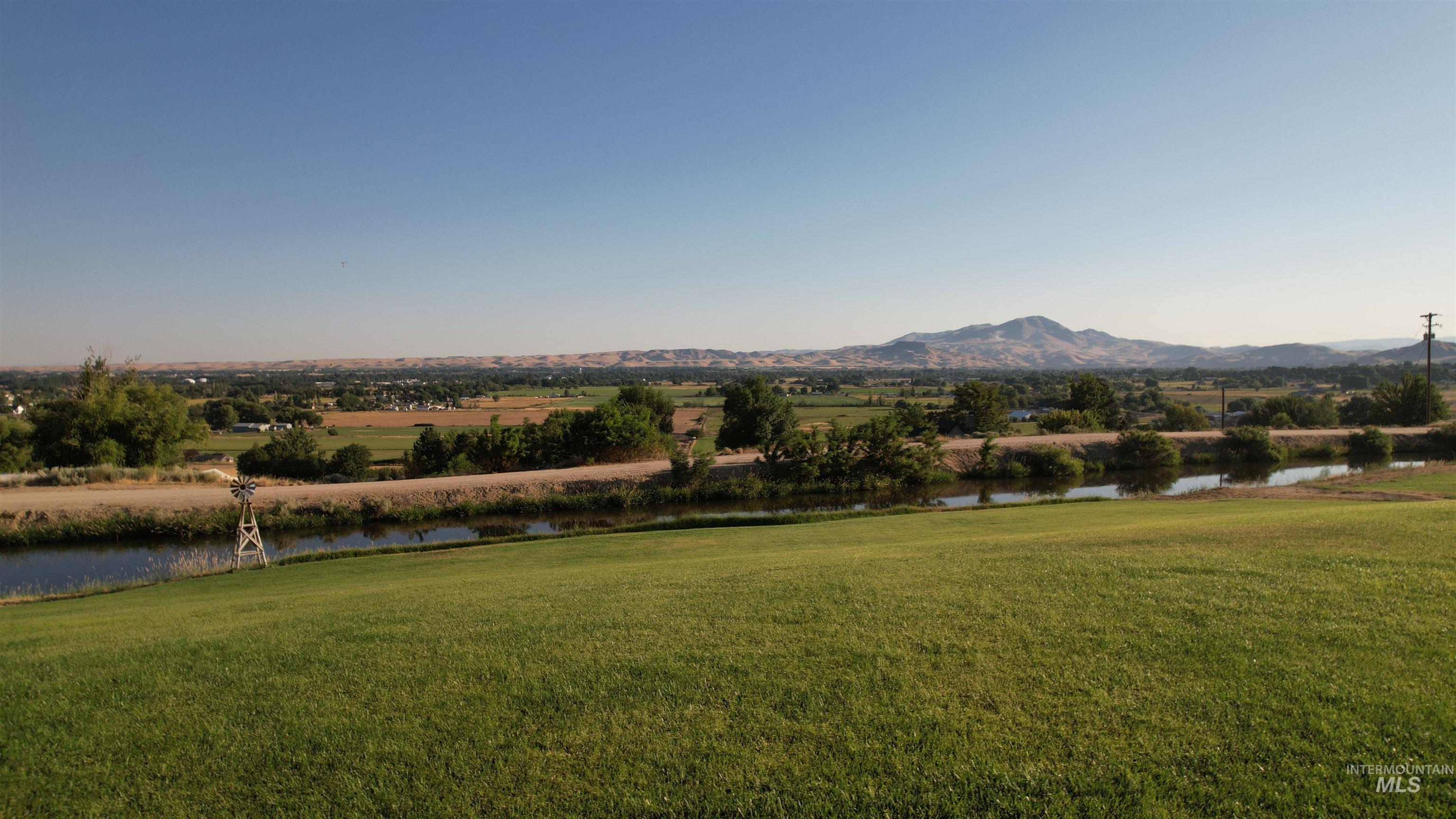 View of mountain background featuring a nearby body of water