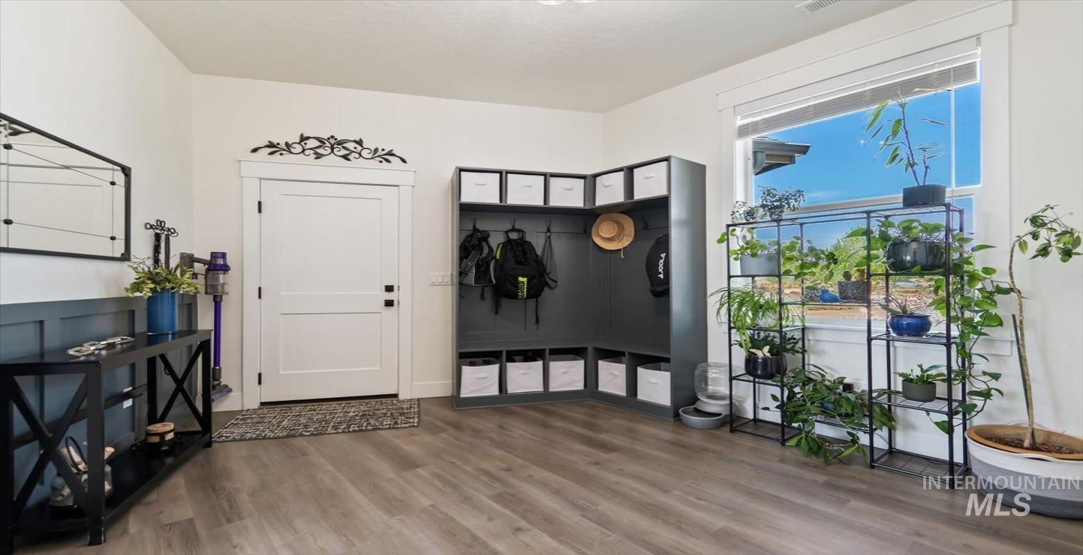 Mudroom from garage with built-in cubbies