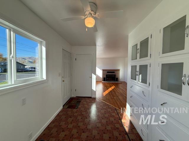 Dining room with  healthy amount of natural light, adjacent to kitchen and  living room