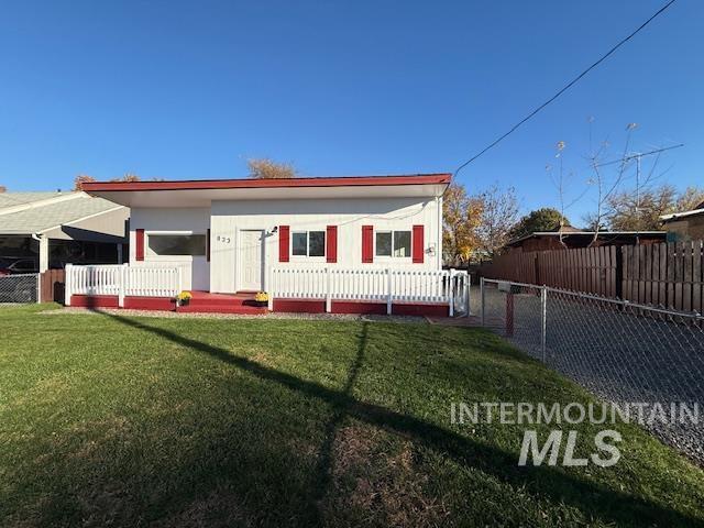 View of front of house with a deck