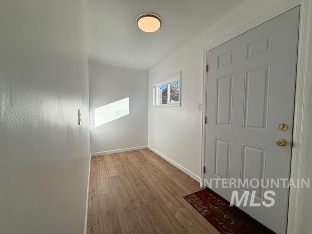Enclosed mud room off back door with lots of room for coats, shoes etc.