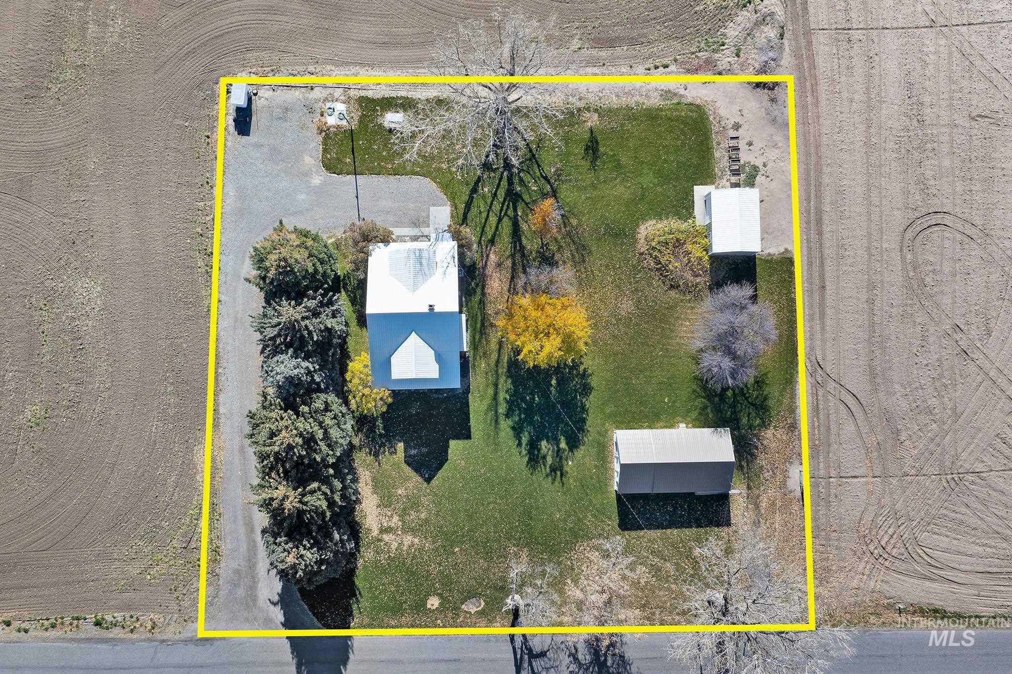 Aerial overview of property's location featuring property parcel outlined