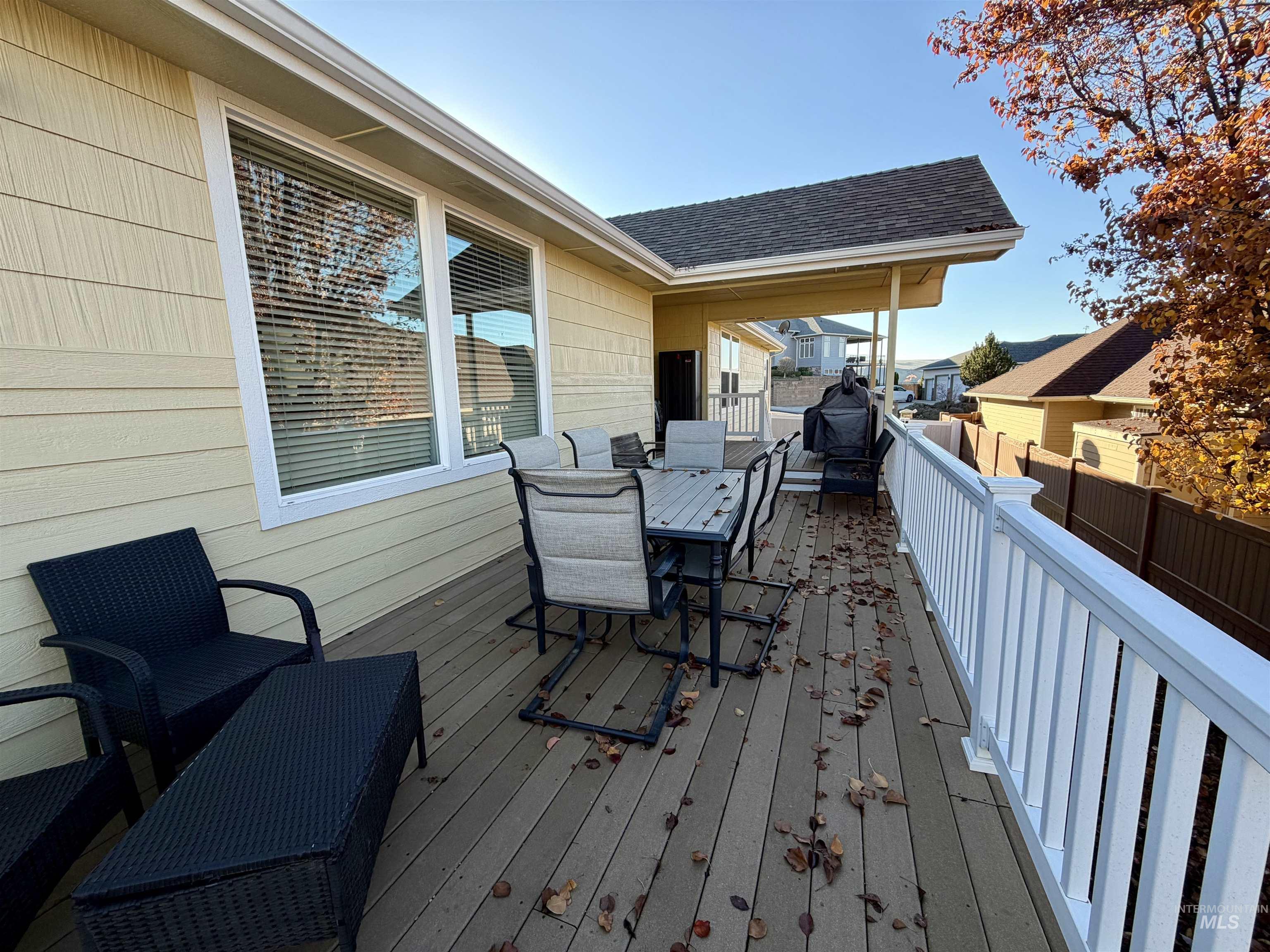 Wooden deck with outdoor dining area