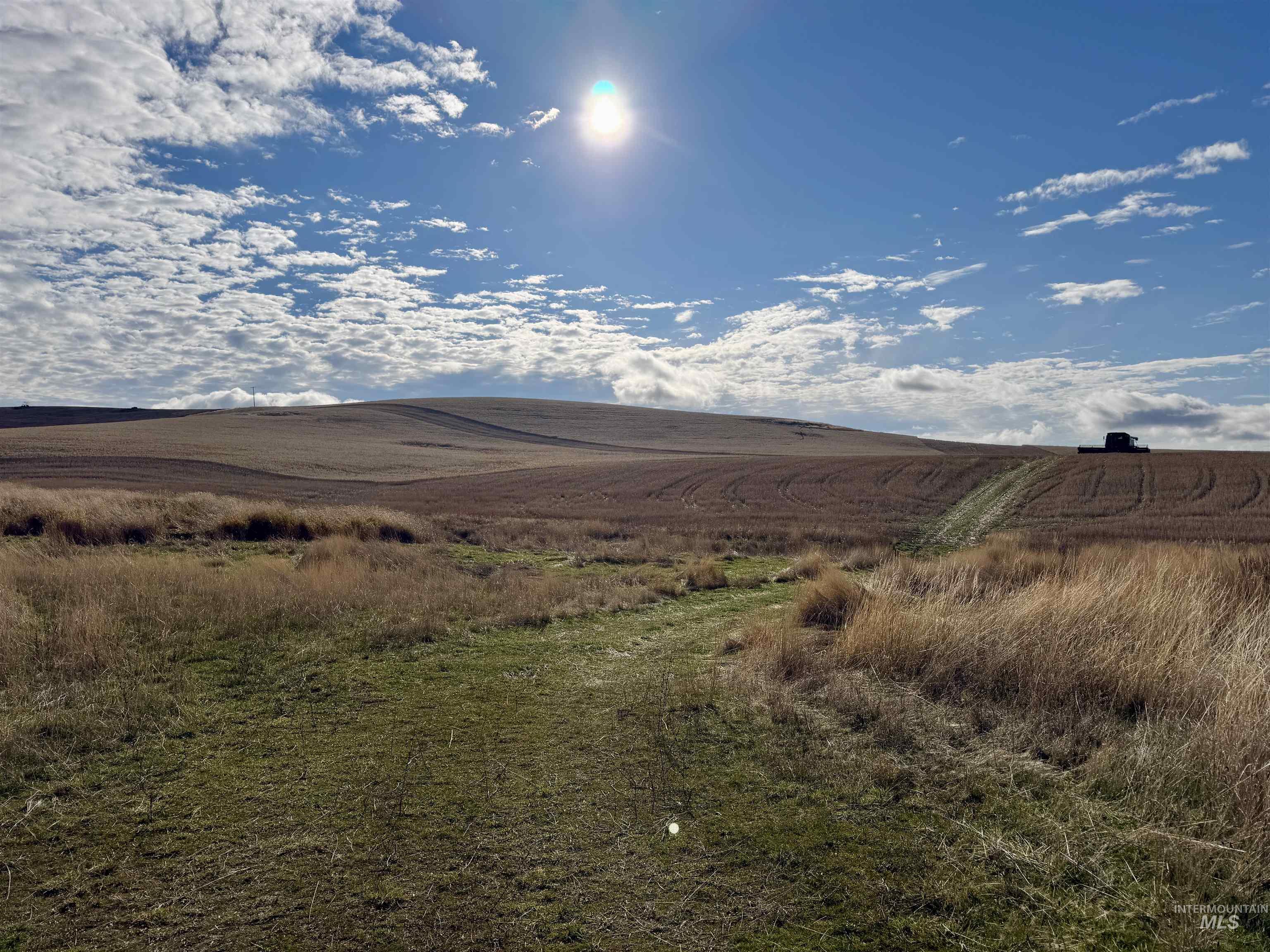 View of mountain background featuring rural landscape
