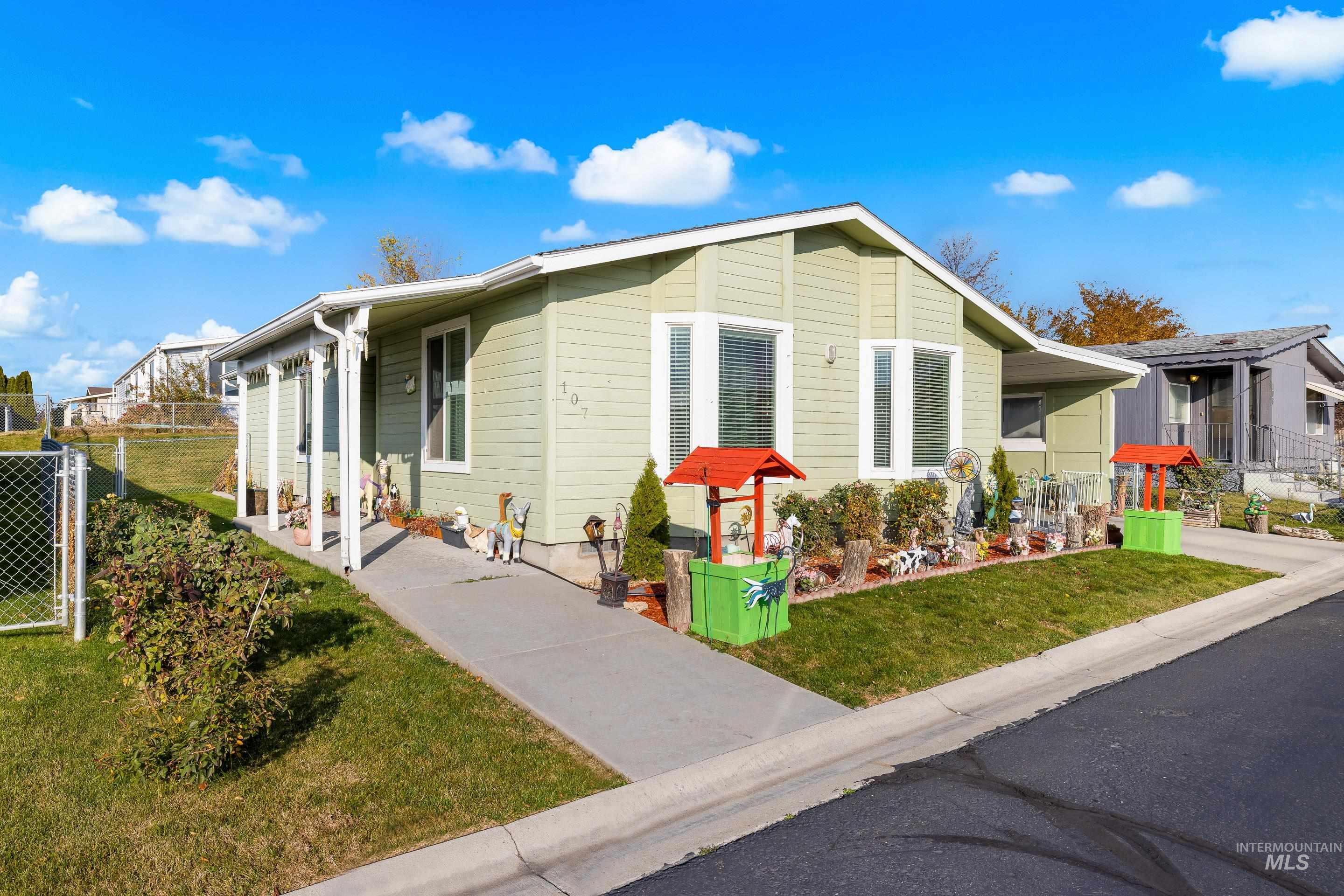 View of front of house with a carport