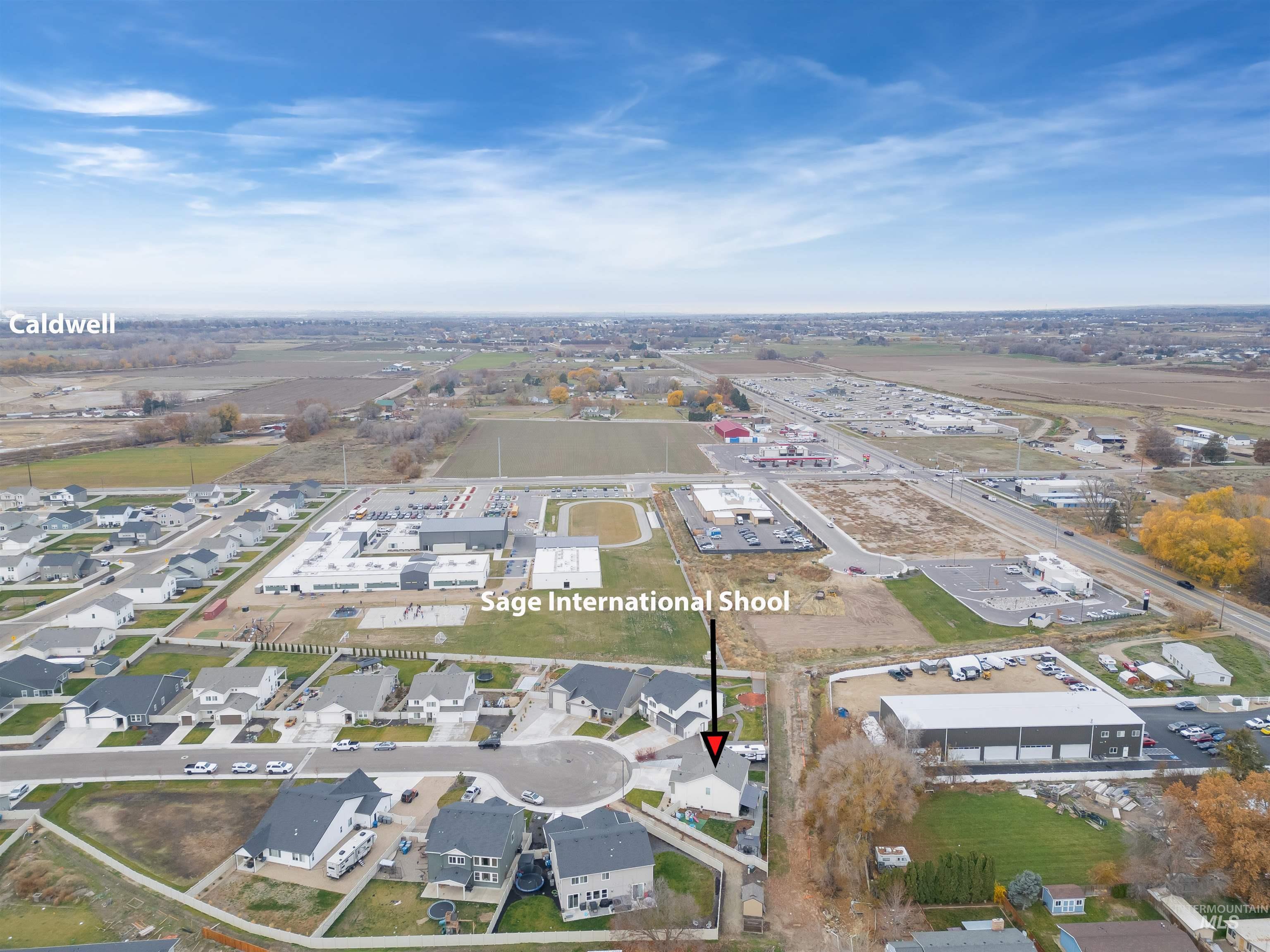 Aerial view of property and surrounding area