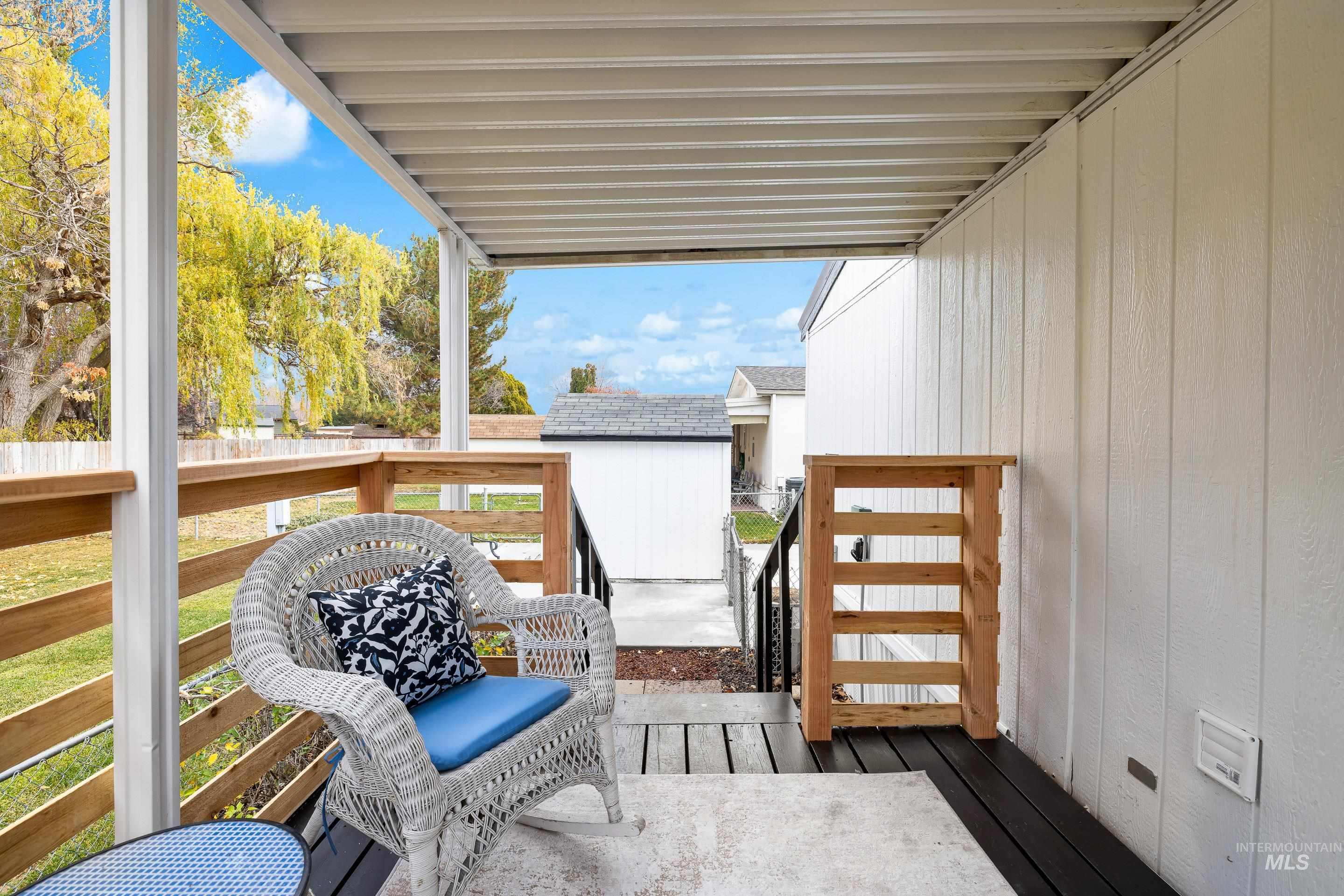 View of wooden balcony featuring a wooden deck