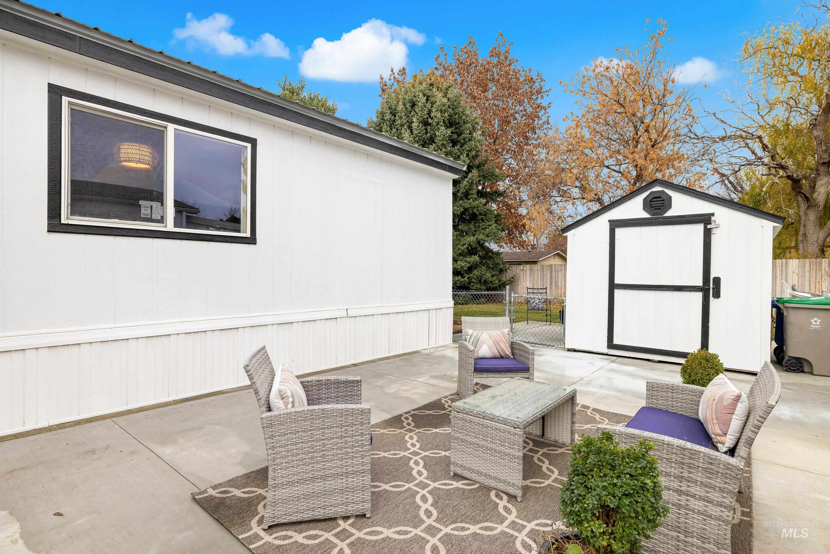 View of patio / terrace featuring a shed and outdoor lounge area