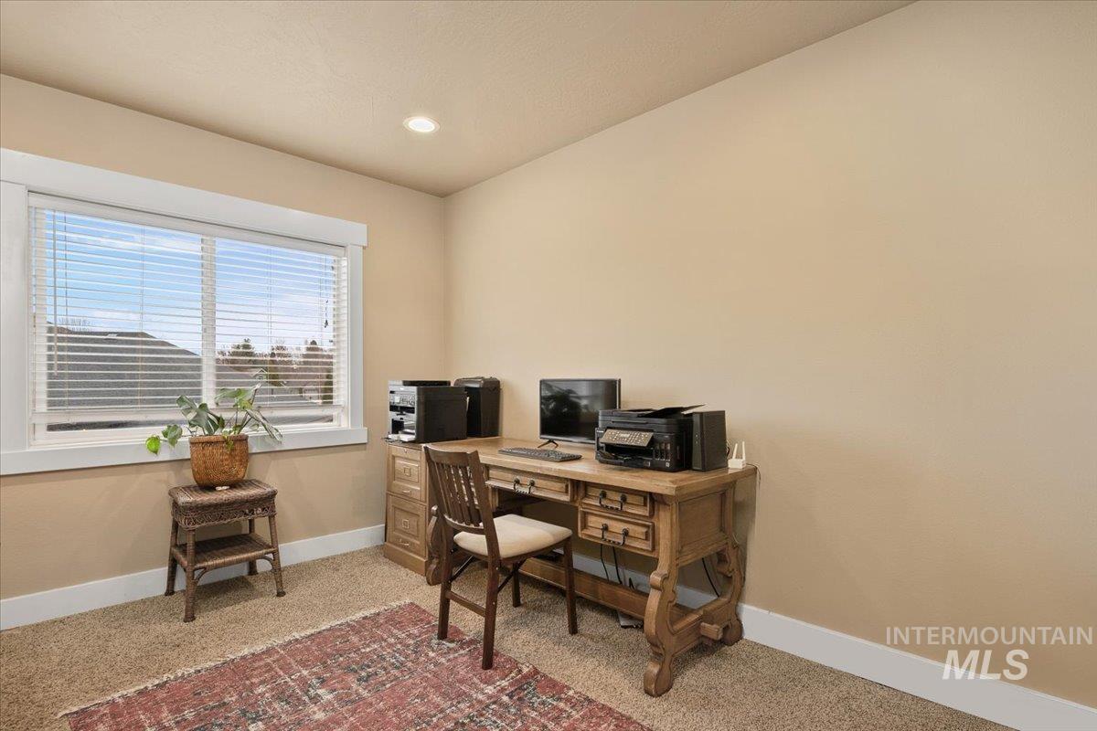 Home office featuring carpet floors and recessed lighting